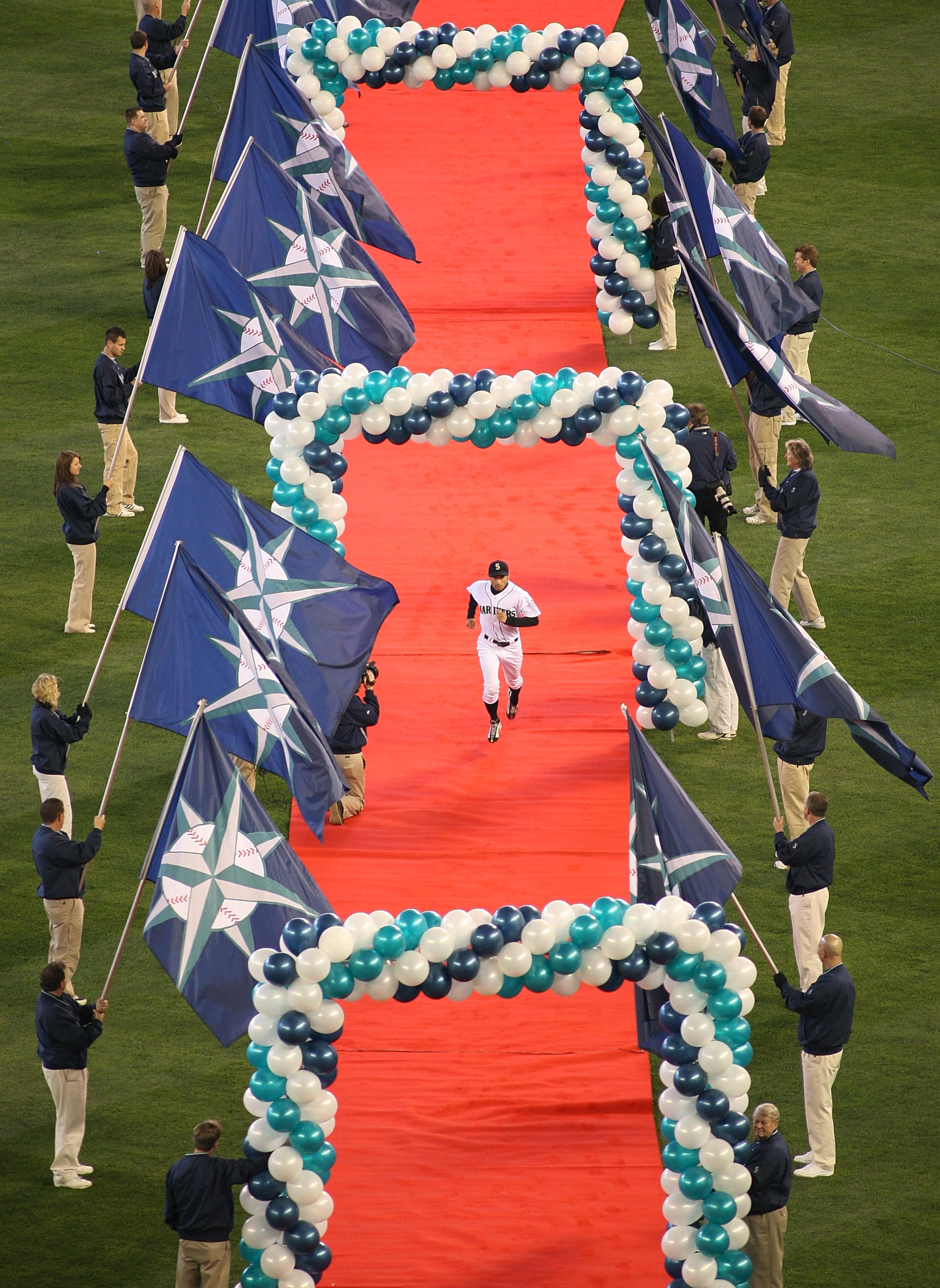 SEATTLE - APRIL 14:  Ichiro Suzuki #51 of the Seattle Mariners is introduced against the Los Angeles Angels of Anaheim during the Opening Day game on April 14, 2009 at Safeco Field in Seattle, Washington. (Photo by Otto Greule Jr/Getty Images)