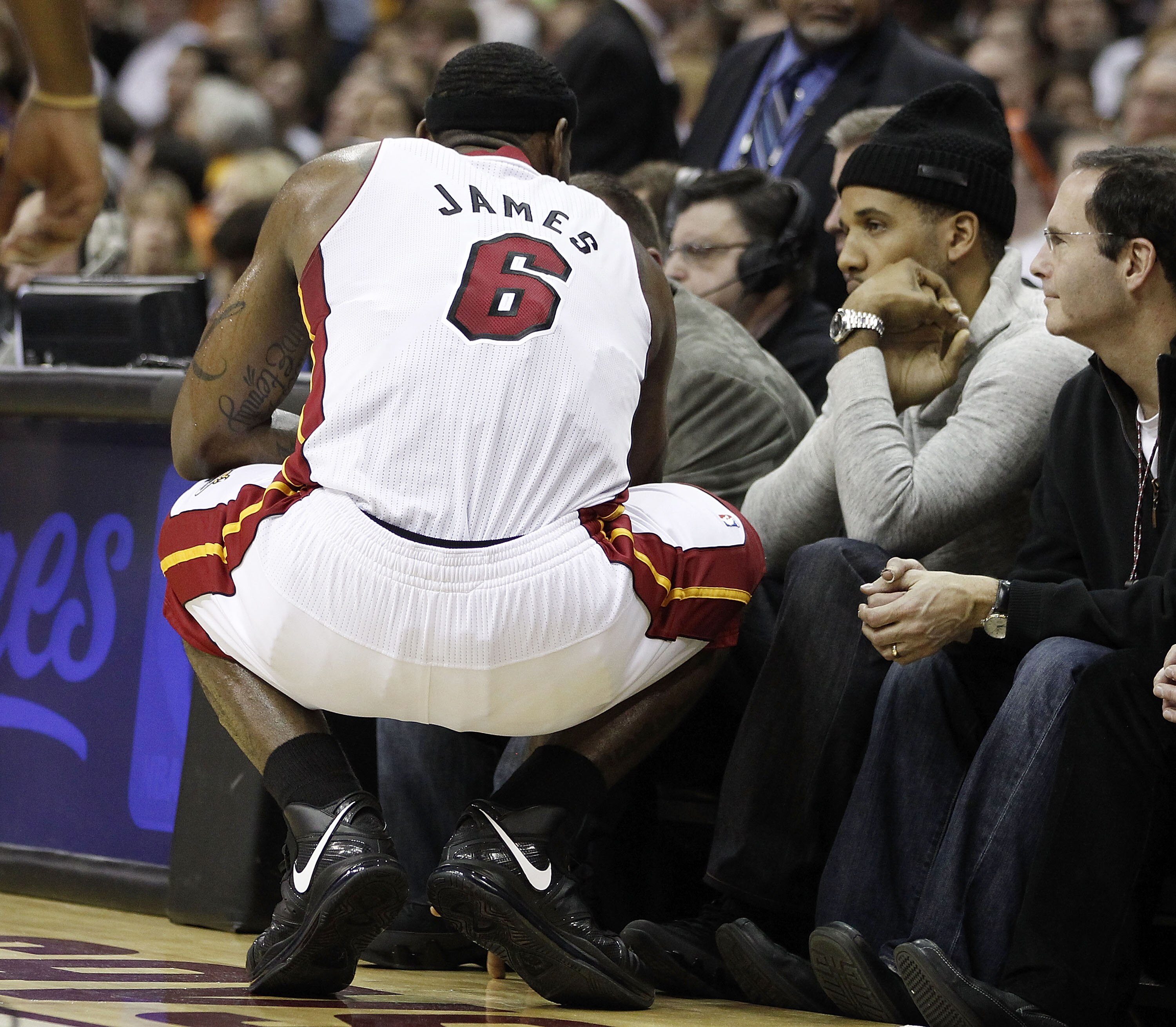 CLEVELAND, OH - DECEMBER 02:  LeBron James #6 of the Miami Heat talks with Maverick Carter while playing the Cleveland Cavaliers at Quicken Loans Arena on December 2, 2010 in Cleveland, Ohio. NOTE TO USER: User expressly acknowledges and agrees that, by d
