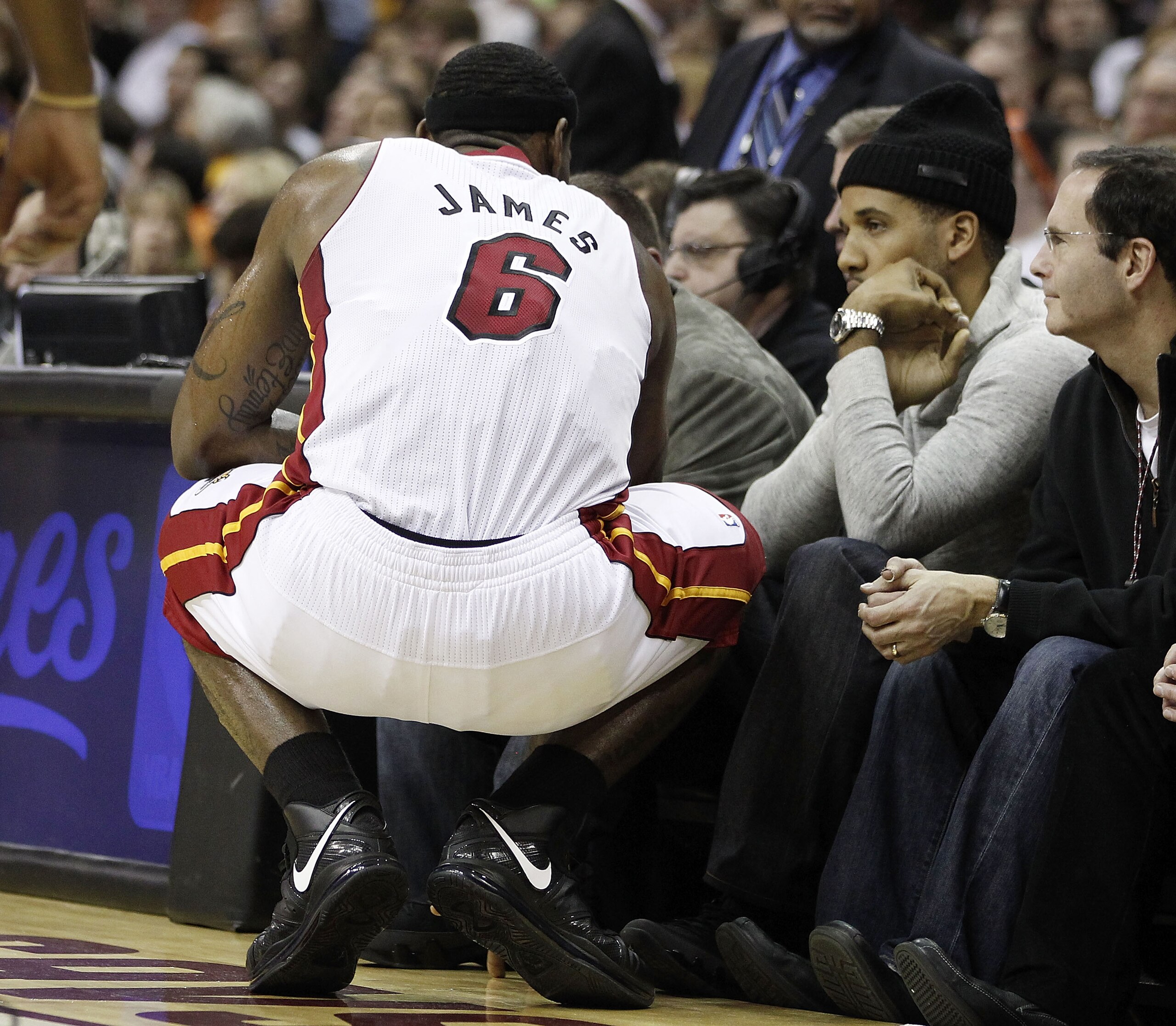 CLEVELAND, OH - DECEMBER 02:  LeBron James #6 of the Miami Heat talks with Maverick Carter while playing the Cleveland Cavaliers at Quicken Loans Arena on December 2, 2010 in Cleveland, Ohio. NOTE TO USER: User expressly acknowledges and agrees that, by d
