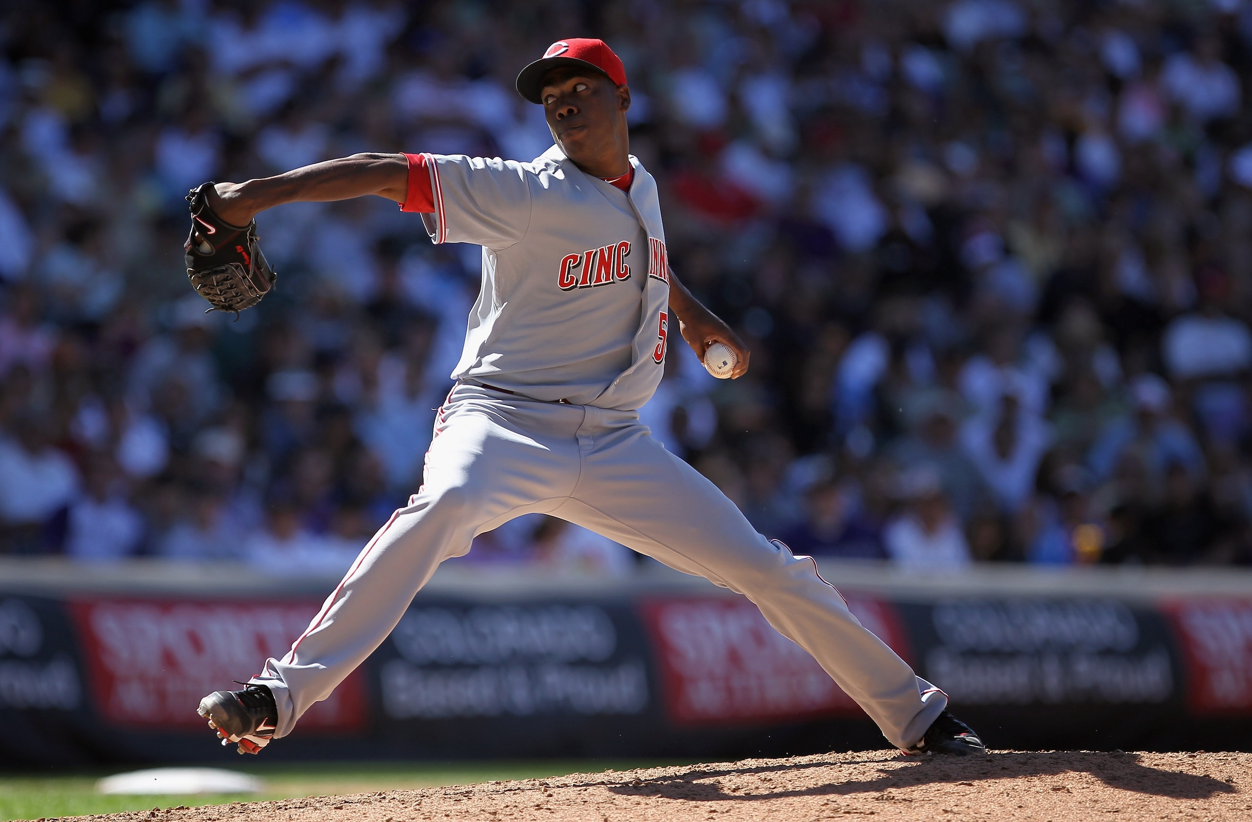 DENVER - SEPTEMBER 06: Relief pitcher Aroldis Chapman #54 of the Cincinnati Reds delivers against the Colorado Rockies at Coors Field on September 6, 2010 in Denver, Colorado. The Rockies defeated the Reds 10-5. (Photo by Doug Pensinger/Getty Images) DENVER - SEPTEMBER 06: Relief pitcher Aroldis Chapman #54 of the Cincinnati Reds delivers against the Colorado Rockies at Coors Field on September 6, 2010 in Denver, Colorado. The Rockies defeated the Reds 10-5. (Photo by Doug Pensinger/Getty Images)
