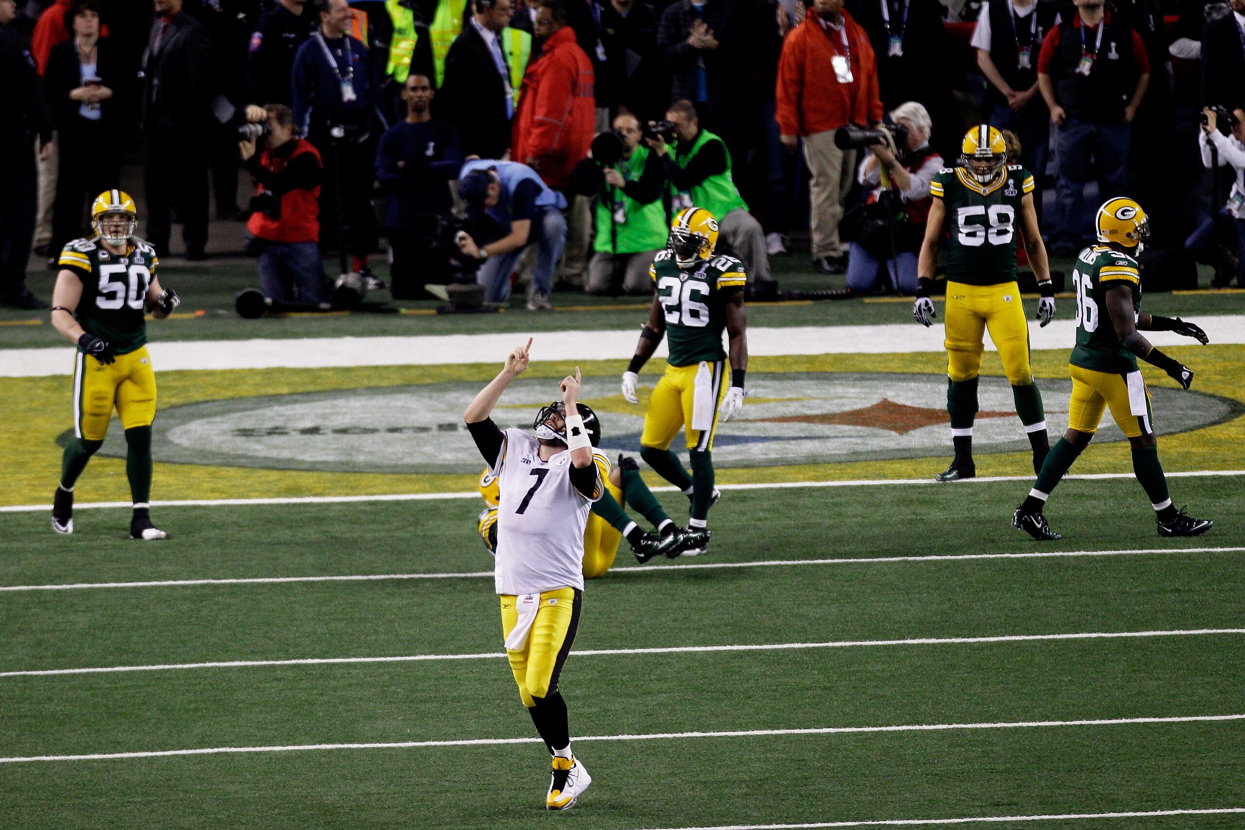 ARLINGTON, TX - FEBRUARY 06: Ben Roethlisberger #7 of the Pittsburgh Steelers celebrates after they scored a two point conversion against the Green Bay Packers in the fourth quarter during Super Bowl XLV at Cowboys Stadium on February 6, 2011 in Arlingto ARLINGTON, TX - FEBRUARY 06: Ben Roethlisberger #7 of the Pittsburgh Steelers celebrates after they scored a two point conversion against the Green Bay Packers in the fourth quarter during Super Bowl XLV at Cowboys Stadium on February 6, 2011 in Arlingto