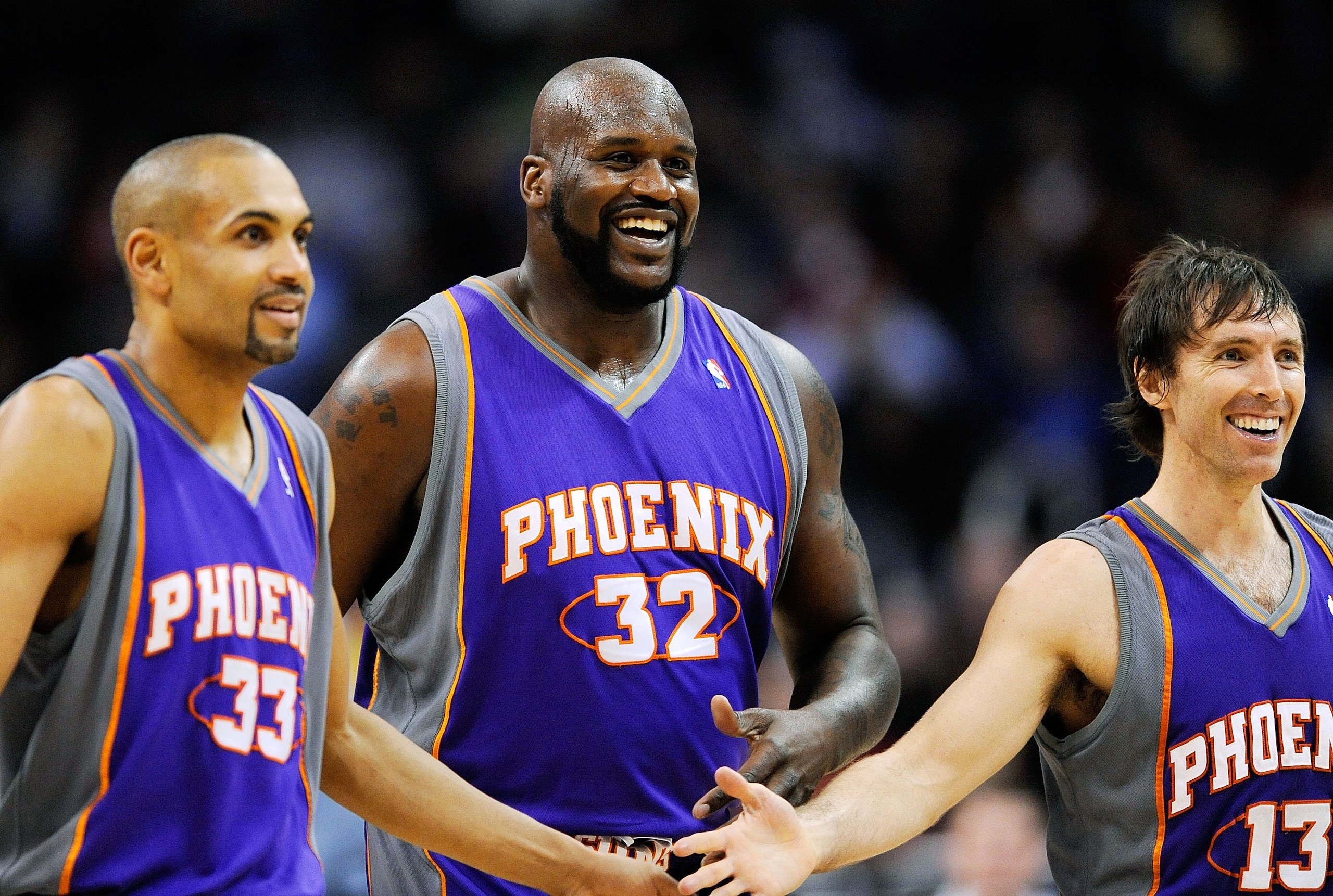 LOS ANGELES, CA - FEBRUARY 18: Shaquille O'Neal #32 of the Phoenix Suns is congratualted by his teammate Steve Nash #13 and Grant Hill #33 during the basketball game against the Los Angeles Clippers during the second quarter at the Staples Center on Febr LOS ANGELES, CA - FEBRUARY 18: Shaquille O'Neal #32 of the Phoenix Suns is congratualted by his teammate Steve Nash #13 and Grant Hill #33 during the basketball game against the Los Angeles Clippers during the second quarter at the Staples Center on Febr