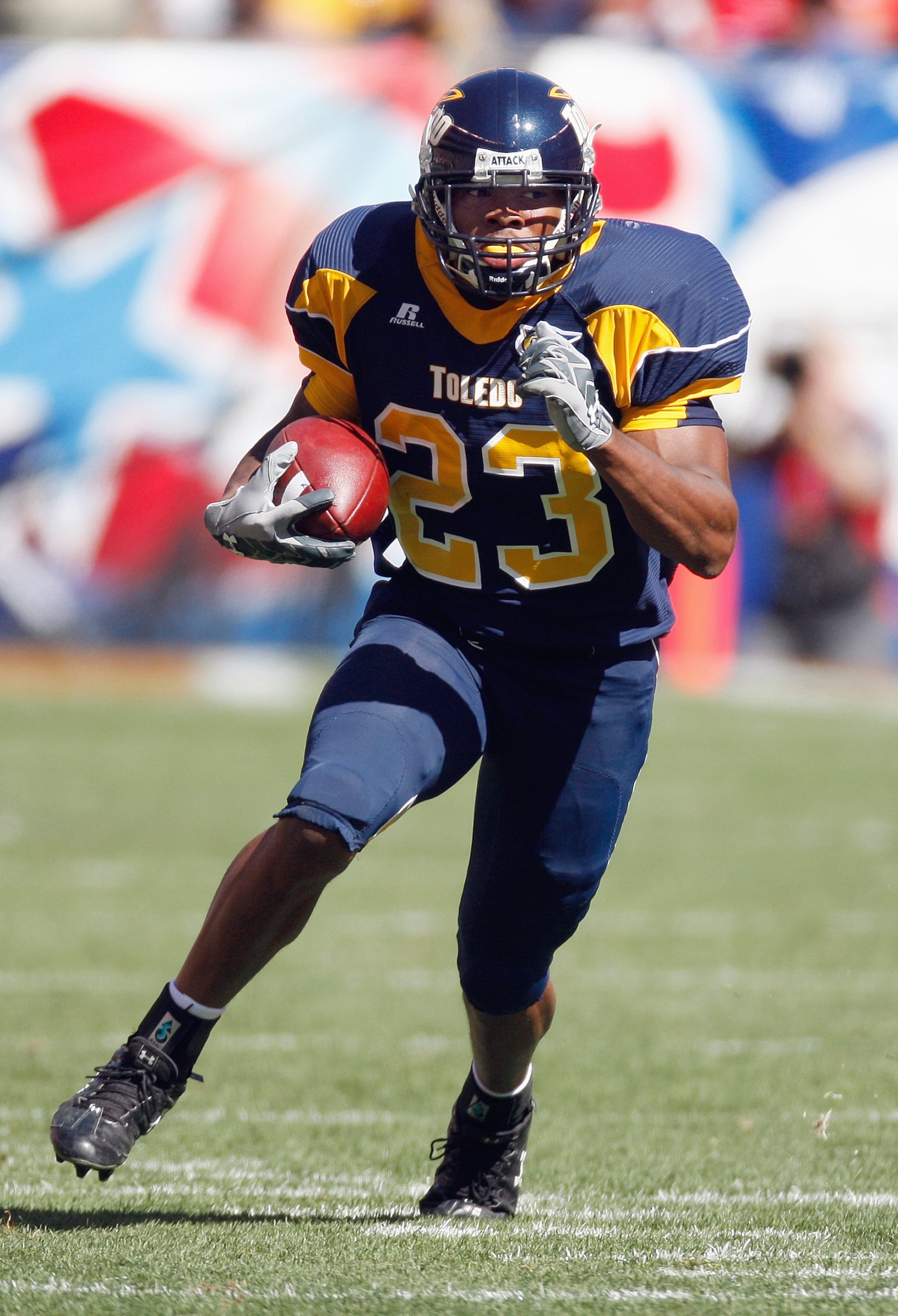 CLEVELAND - SEPTEMBER 19: Morgan Williams #23 of the Toledo Rockets carries the ball during the game against the Ohio State Buckeyes  at Cleveland Browns Stadium on September 19, 2009 in Cleveland, Ohio. The Ohio State Buckeyes shutout the Toledo Rockets 