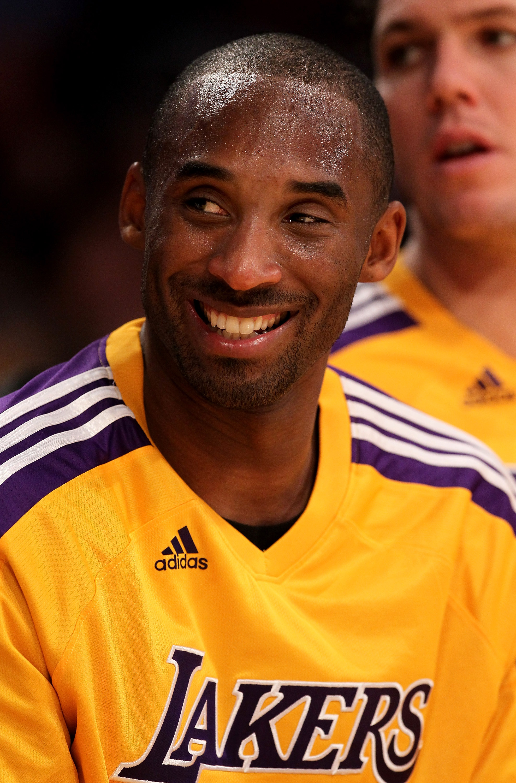 LOS ANGELES, CA - NOVEMBER 05:  Kobe Bryant #24 of the Los Angeles Lakers smiles on the bench in the game with the Toronto Raptors at Staples Center on November 5, 2010 in Los Angeles, California.  The Lakers won 108-102.   NOTE TO USER: User expressly ac