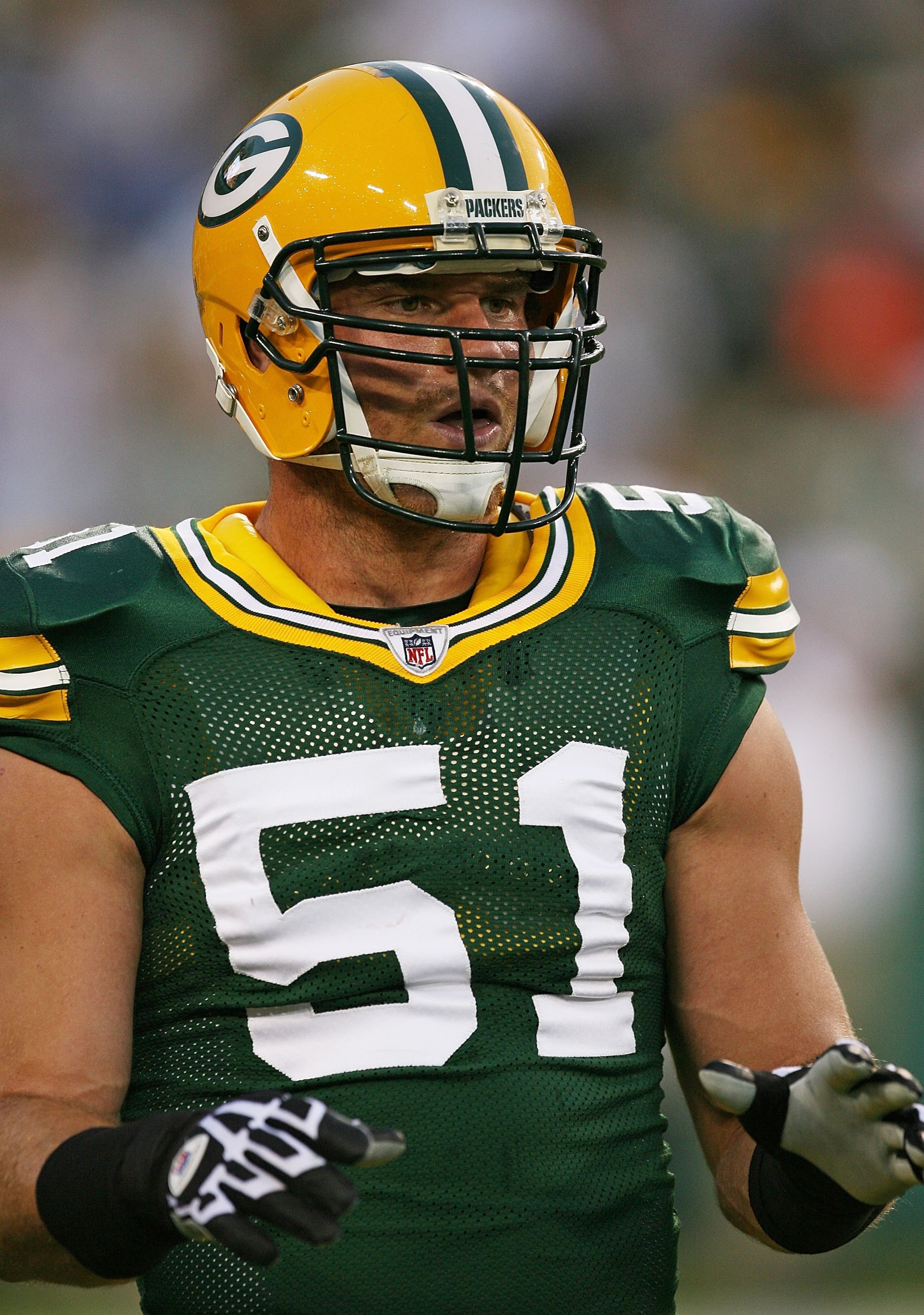 GREEN BAY, WI - SEPTEMBER 13: Brady Poppinga #51 of the Green Bay Packers participates in warm-ups before a game against the Chicago Bears on September 13, 2009 at Lambeau Field in Green Bay, Wisconsin. The Packers defeated the Bears 21-15.  (Photo by Jon