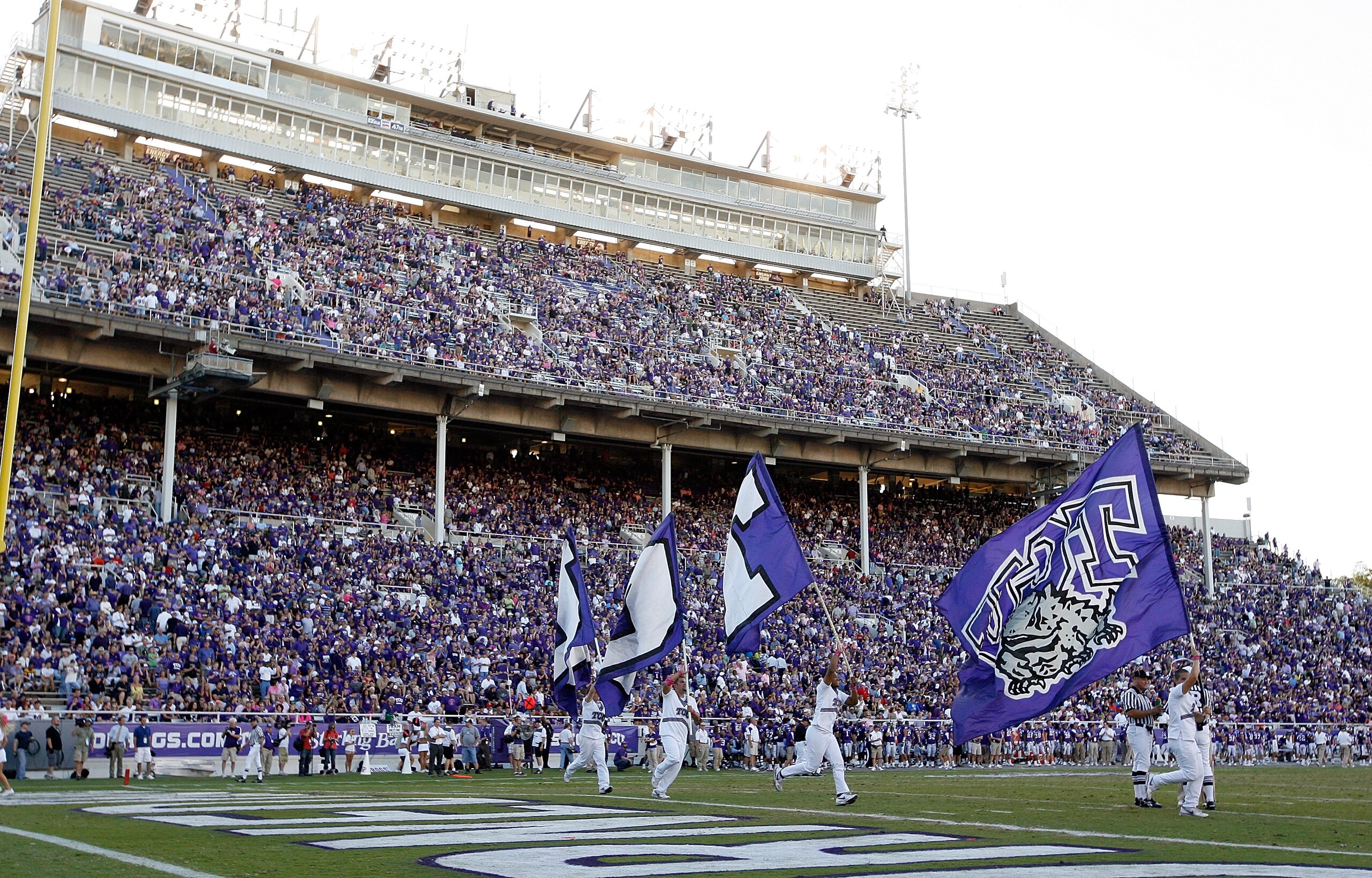 FORT WORTH, TX - OCTOBER 16: TCU Horned Frogs fans fill the stands as TCU takes to the field against the BYU Cougars at Amon G. Carter Stadium on October 16, 2010 in Fort Worth, Texas. TCU beat BYU 31-3. (Photo by Tom Pennington/Getty Images) FORT WORTH, TX - OCTOBER 16: TCU Horned Frogs fans fill the stands as TCU takes to the field against the BYU Cougars at Amon G. Carter Stadium on October 16, 2010 in Fort Worth, Texas. TCU beat BYU 31-3. (Photo by Tom Pennington/Getty Images)