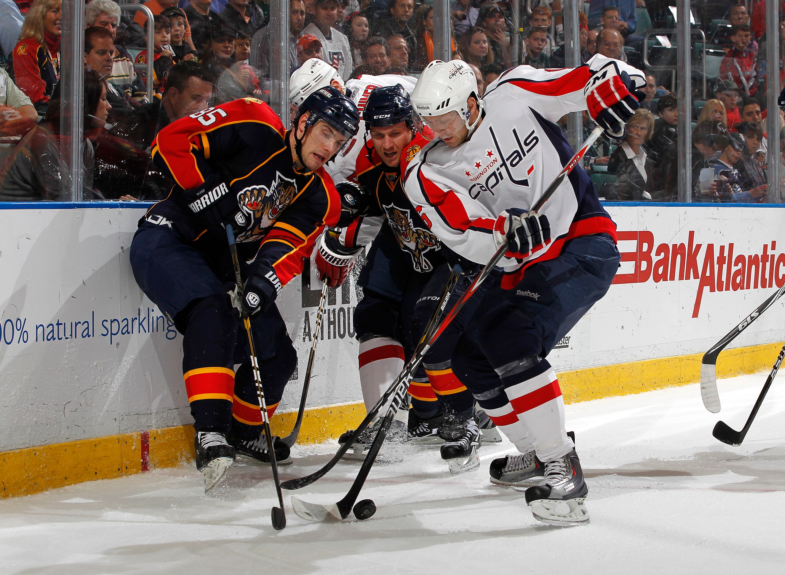 SUNRISE, FL - JANUARY 11: Eric Fehr #16 of the Washington Capitals battles behind the net with Rostislav Olesz #85 of the Florida Panthers on January 11, 2011 at the BankAtlantic Center in Sunrise, Florida. The Panthers defeated the Capitals 4-3 in overti