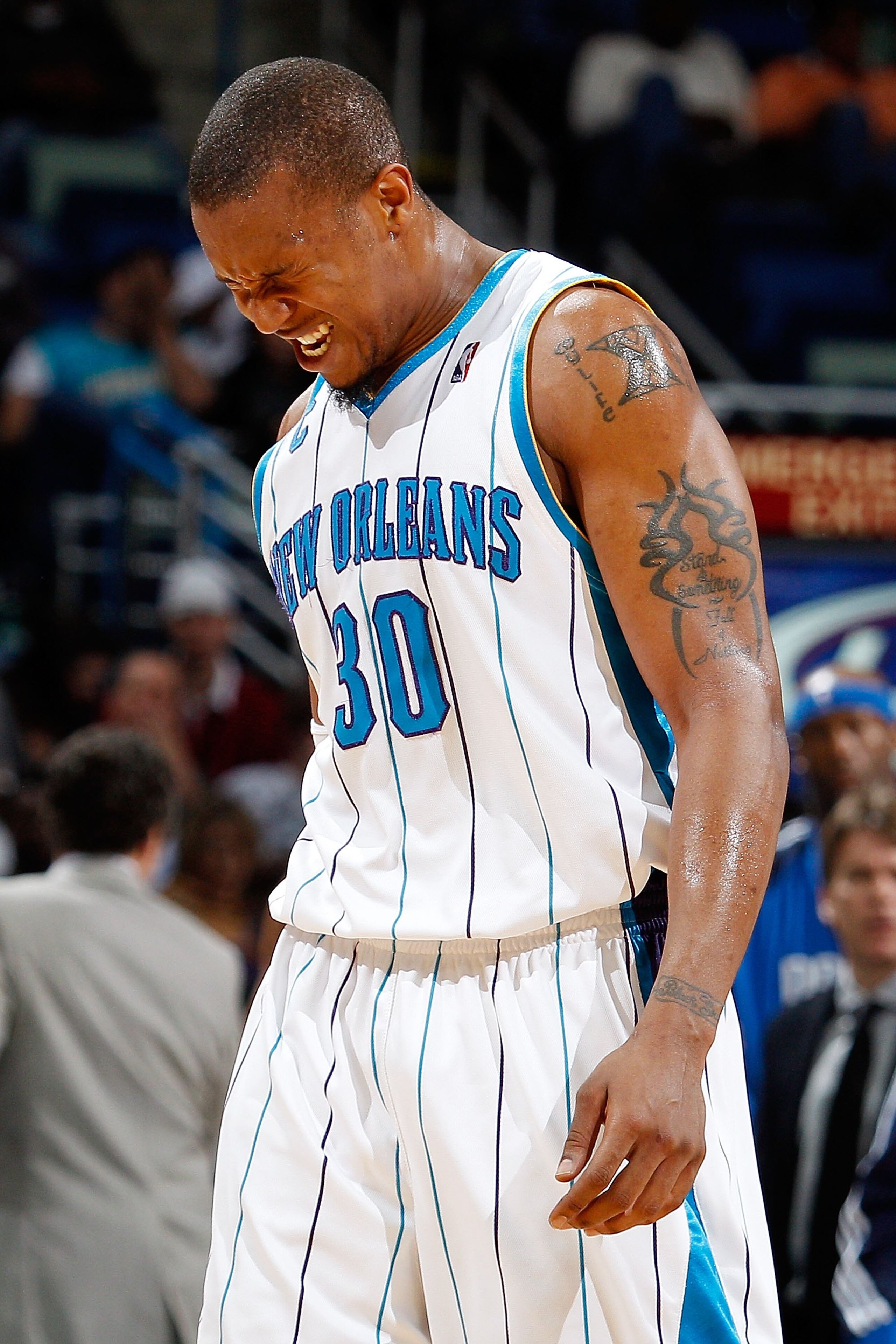 NEW ORLEANS - MARCH 22:  David West #30 of the New Orleans Hornets reacts after falling on the court during the game against the Dallas Mavericks at the New Orleans Arena on March 22, 2010 in New Orleans, Louisiana.  NOTE TO USER: User expressly acknowled