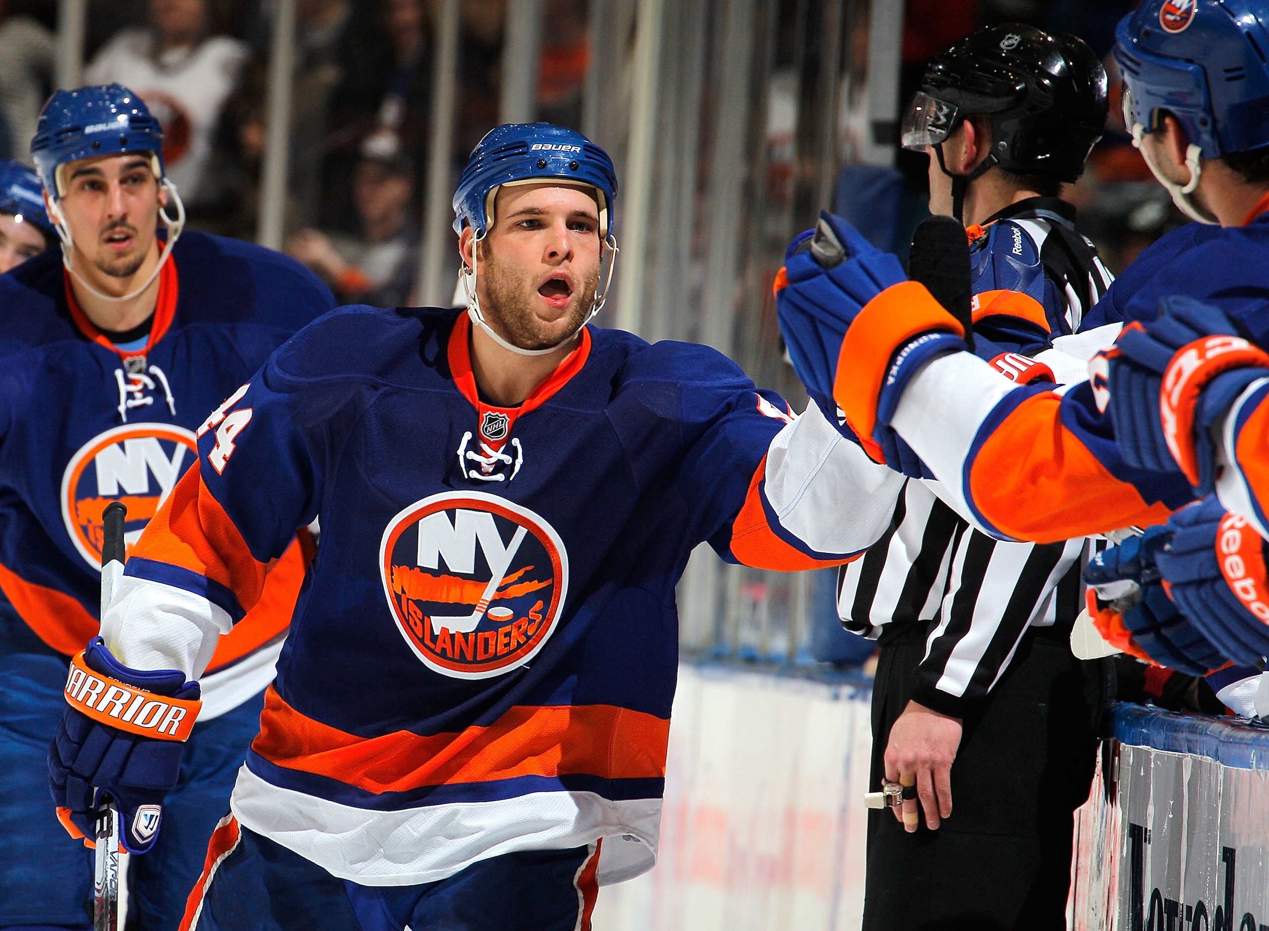 UNIONDALE, NY - FEBRUARY 05:  Rob Schremp #44 of the New York Islanders celebrates his goal with teammates during the first period of an NHL hockey game against the Ottawa Senators at the Nassau Coliseum on February 5, 2011 in Uniondale, New York.  (Photo