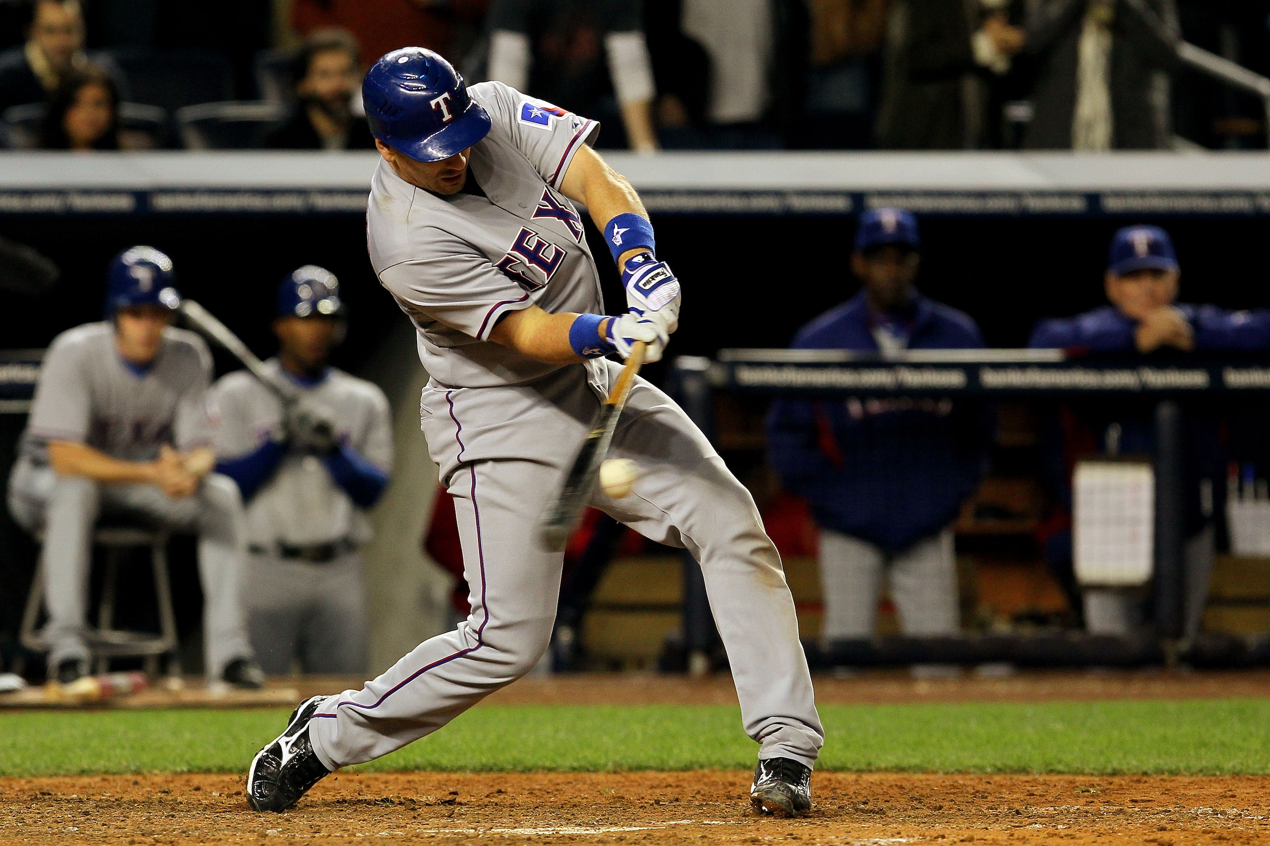 NEW YORK - OCTOBER 20: Matt Treanor #15 of the Texas Rangers hits a RBI ground out in the top of the sixth inning against the New York Yankees in Game Five of the ALCS during the 2010 MLB Playoffs at Yankee Stadium on October 20, 2010 in the Bronx borou NEW YORK - OCTOBER 20: Matt Treanor #15 of the Texas Rangers hits a RBI ground out in the top of the sixth inning against the New York Yankees in Game Five of the ALCS during the 2010 MLB Playoffs at Yankee Stadium on October 20, 2010 in the Bronx borou