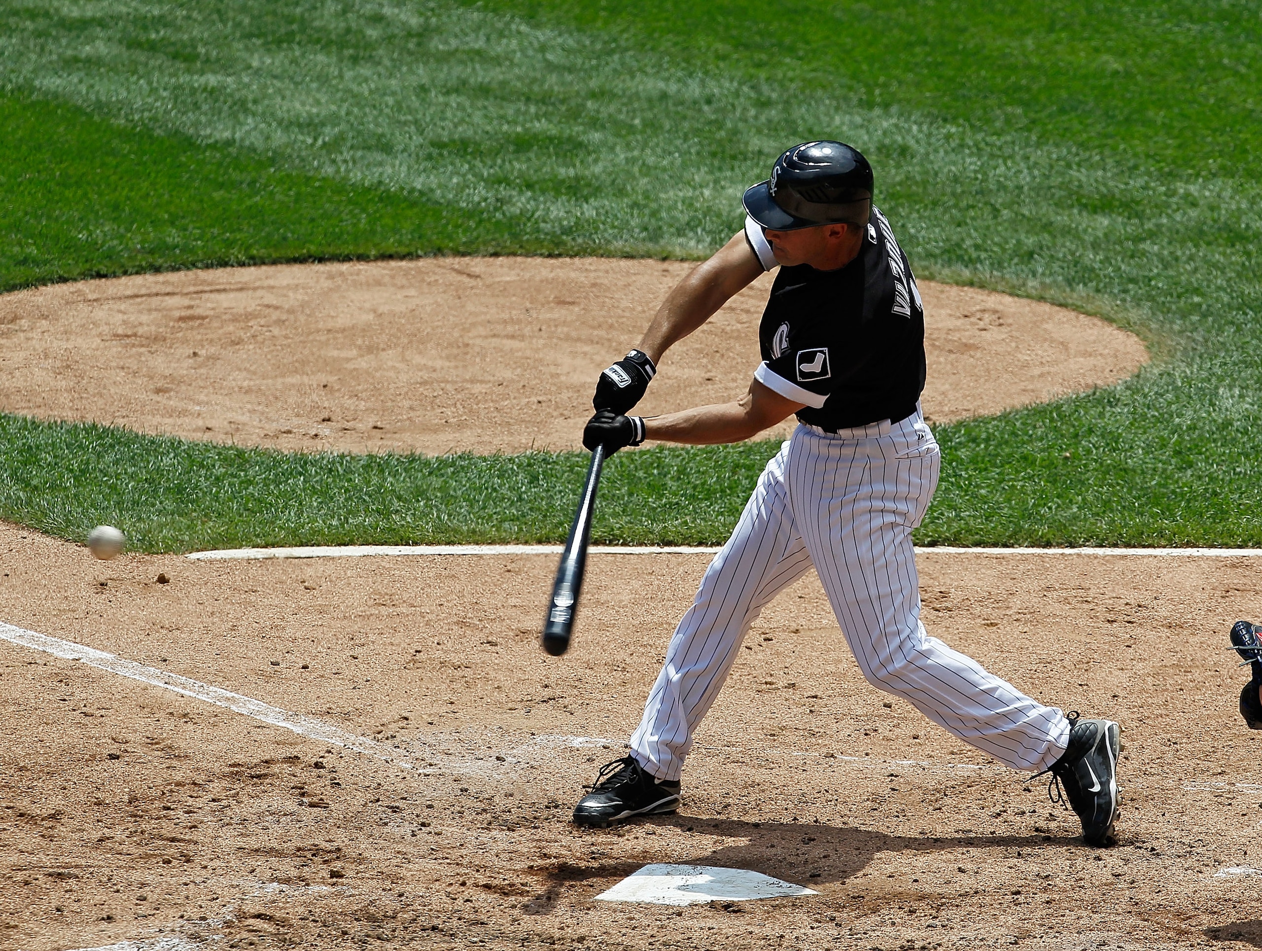 CHICAGO - JUNE 27: Omar Vizquel #11 of the Chicago White Sox takes a swing against the Chicago Cubs at U.S. Cellular Field on June 27, 2010 in Chicago, Illinois. The Cubs defeated the White Sox 8-6. (Photo by Jonathan Daniel/Getty Images) CHICAGO - JUNE 27: Omar Vizquel #11 of the Chicago White Sox takes a swing against the Chicago Cubs at U.S. Cellular Field on June 27, 2010 in Chicago, Illinois. The Cubs defeated the White Sox 8-6. (Photo by Jonathan Daniel/Getty Images)