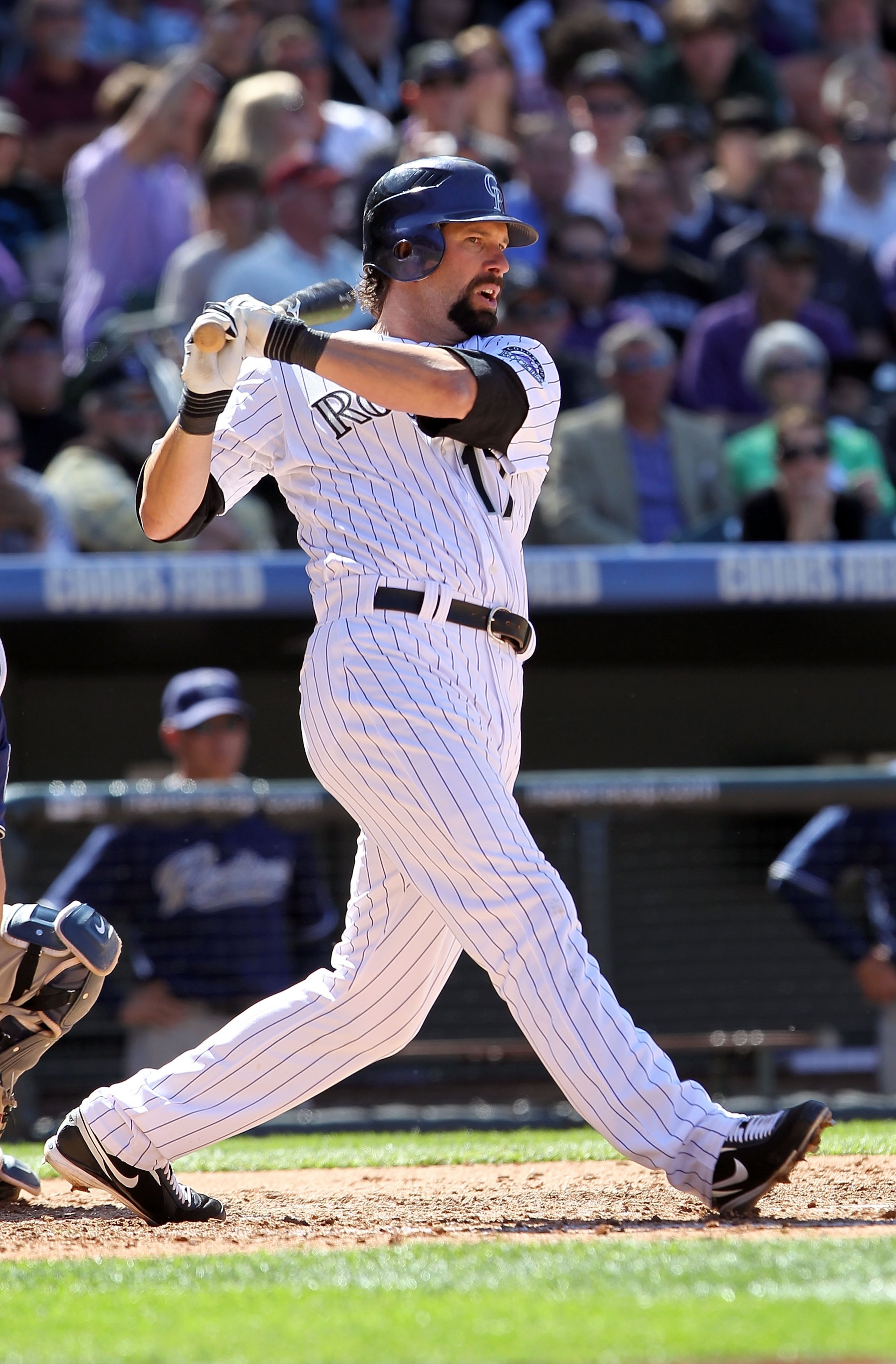 DENVER - APRIL 09: Todd Helton #17 of the Colorado Rockies takes an at bat against the San Diego Padres during MLB action on Opening Day at Coors Field on April 9, 2010 in Denver, Colorado. The Rockies defeated the Padres 7-0. (Photo by Doug Pensinger/G DENVER - APRIL 09: Todd Helton #17 of the Colorado Rockies takes an at bat against the San Diego Padres during MLB action on Opening Day at Coors Field on April 9, 2010 in Denver, Colorado. The Rockies defeated the Padres 7-0. (Photo by Doug Pensinger/G