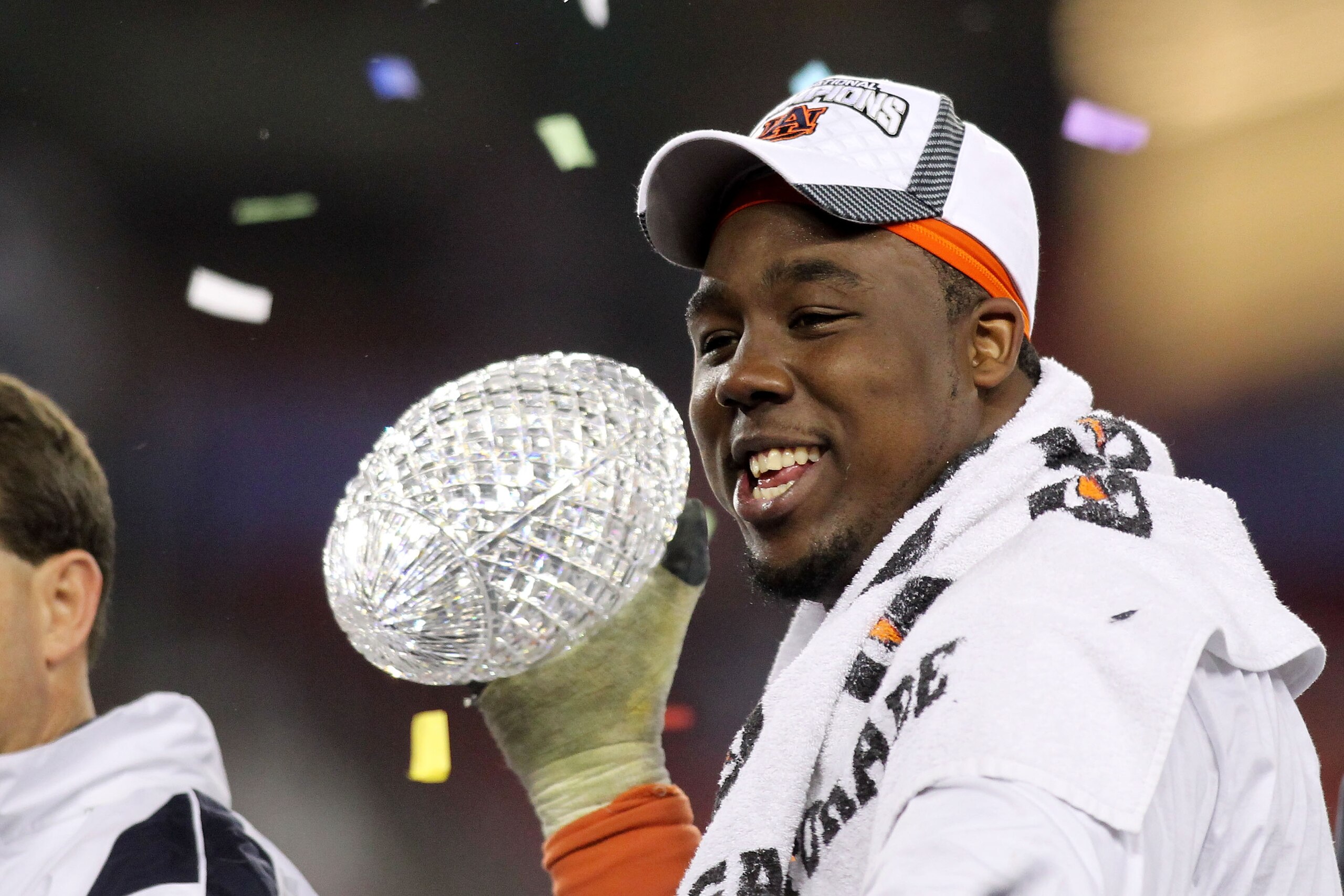 GLENDALE, AZ - JANUARY 10:  Nick Fairley #90 of the Auburn Tigers celebrates the Tigers 22-19 victory against the Oregon Ducks during the Tostitos BCS National Championship Game at University of Phoenix Stadium on January 10, 2011 in Glendale, Arizona.  (