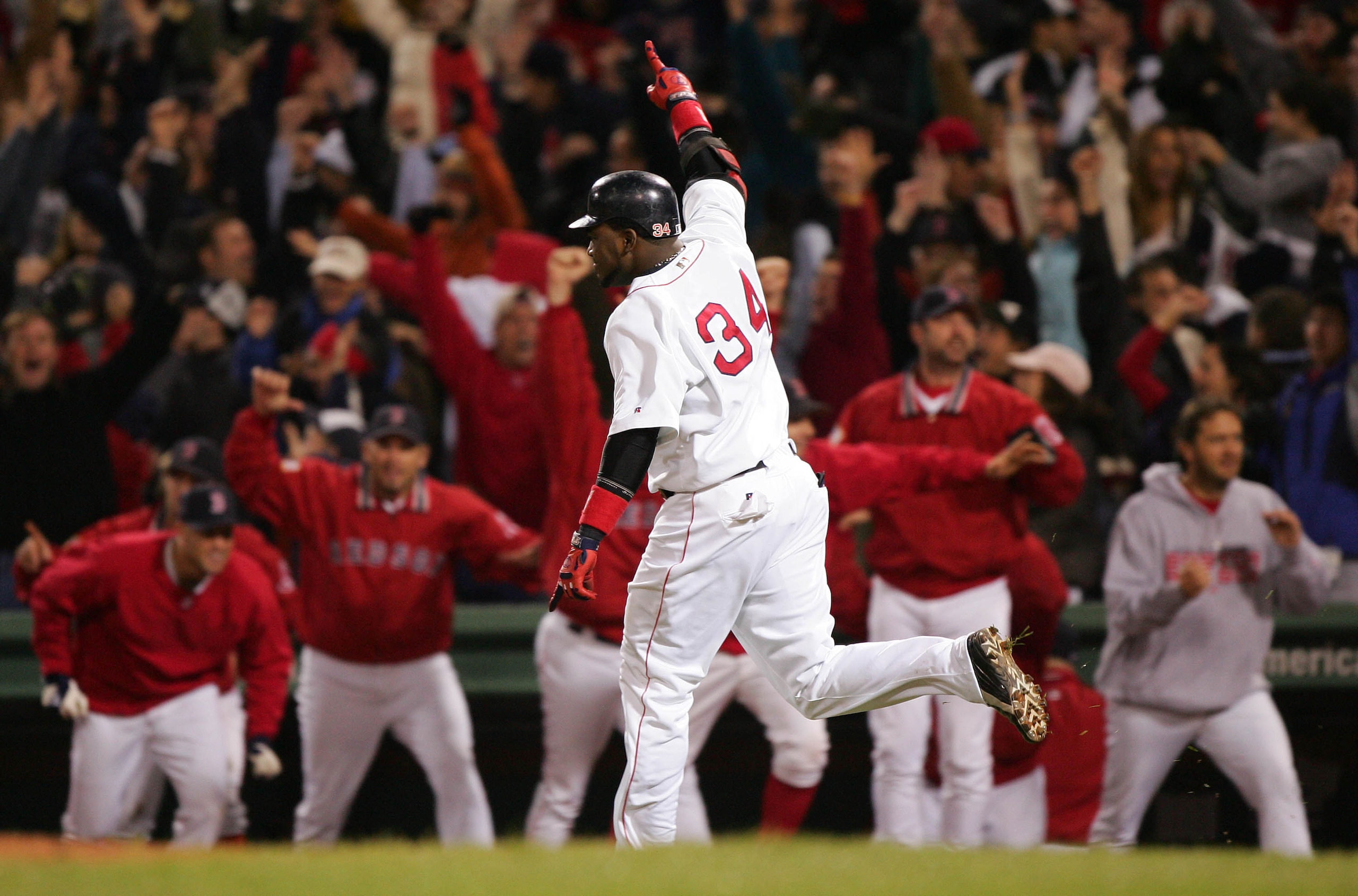 BOSTON - OCTOBER 17: David Ortiz #34 celebrates after hitting the game winning two-run home run against the New York Yankees in the twelfth inning during game four of the American League Championship Series on October 17, 2004 at Fenway Park in Boston, M BOSTON - OCTOBER 17: David Ortiz #34 celebrates after hitting the game winning two-run home run against the New York Yankees in the twelfth inning during game four of the American League Championship Series on October 17, 2004 at Fenway Park in Boston, M