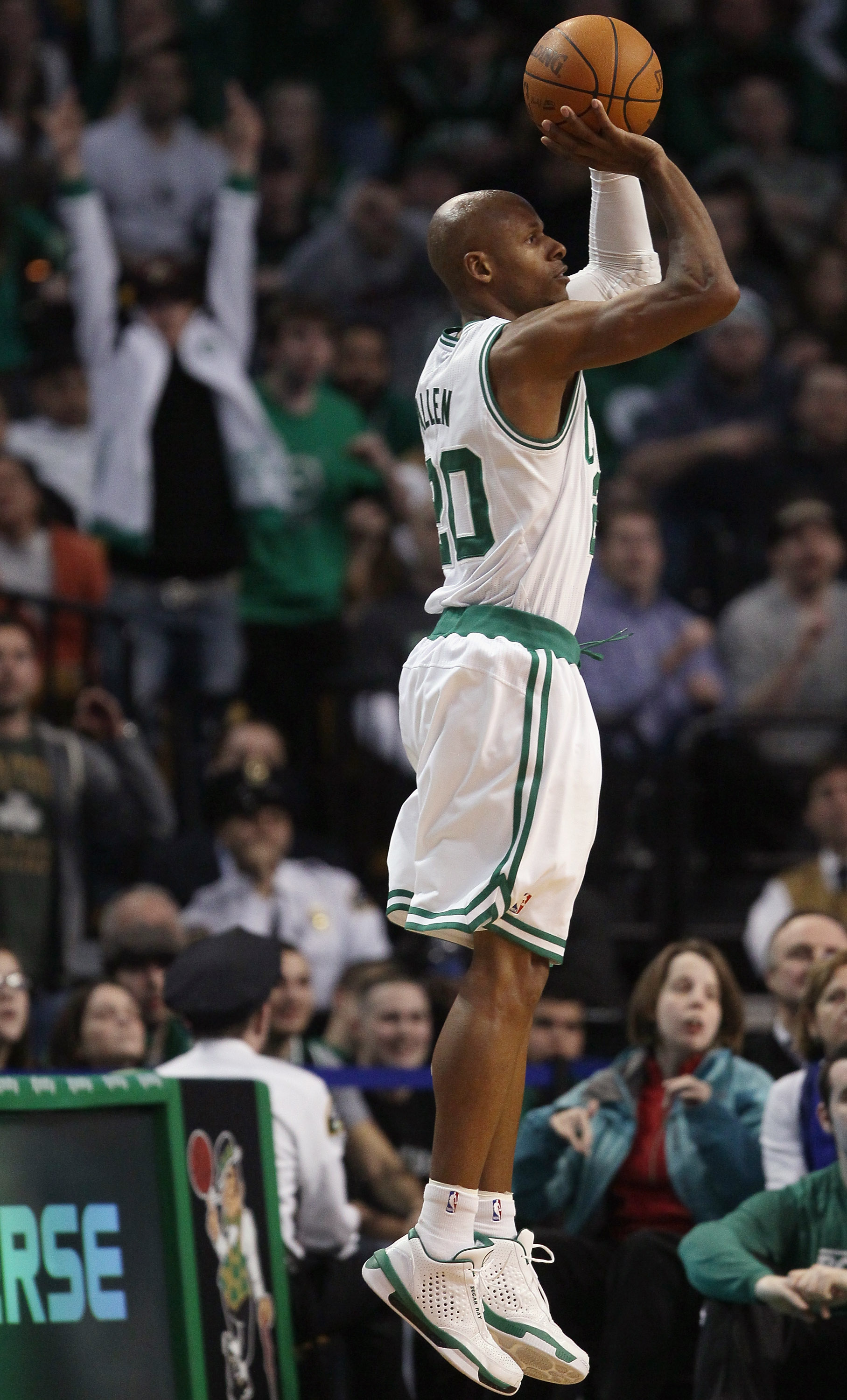 BOSTON, MA - JANUARY 03:  Ray Allen #20 of the Boston Celtics makes three point shot late in the fourth quarter against the Minnesota Timberwolves on January 3, 2011 at the TD Garden in Boston, Massachusetts. The Celtics defeated the Timberwolves 96-93. N