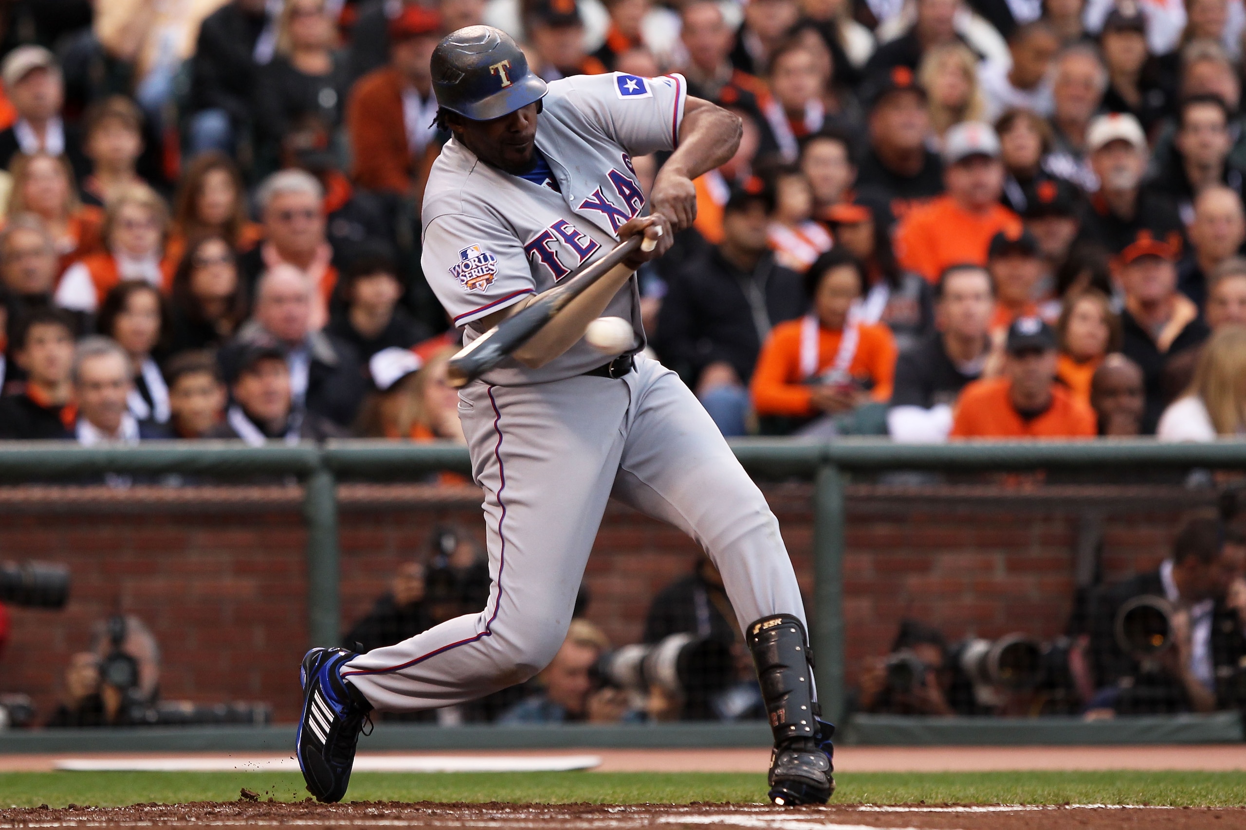 SAN FRANCISCO - OCTOBER 27: Vladimir Guerrero #27 of the Texas Rangers hits an RBI single in the first inning against Tim Lincecum #55 of the San Francisco Giants in Game One of the 2010 MLB World Series at AT&T Park on October 27, 2010 in San Francisco, SAN FRANCISCO - OCTOBER 27: Vladimir Guerrero #27 of the Texas Rangers hits an RBI single in the first inning against Tim Lincecum #55 of the San Francisco Giants in Game One of the 2010 MLB World Series at AT&T Park on October 27, 2010 in San Francisco,