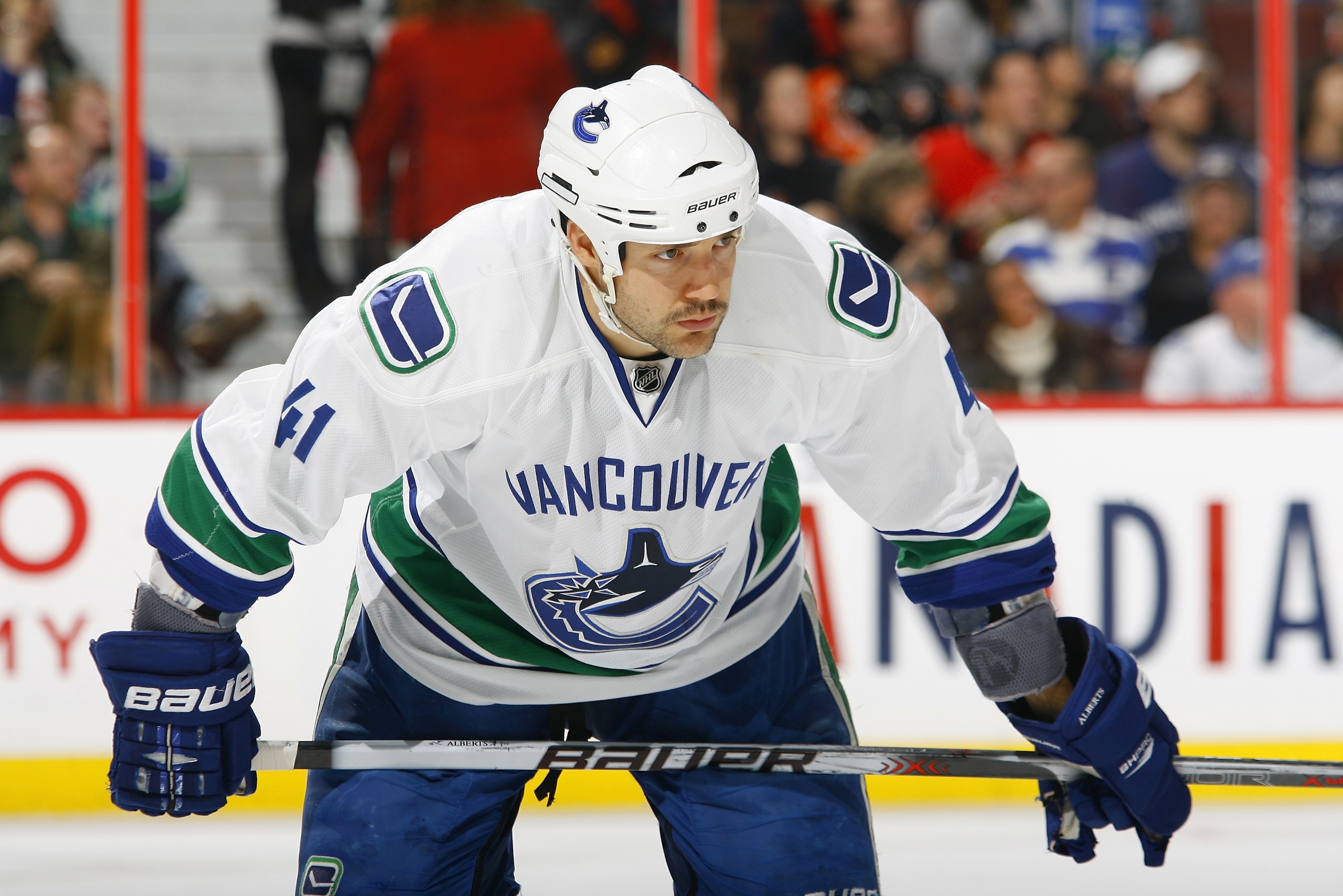 OTTAWA, CANADA - NOVEMBER 11:  Andrew Alberts #41 of the Vancouver Canucks waits for a faceoff during a game against the Ottawa Senators at Scotiabank Place on November 11, 2010 in Ottawa, Ontario, Canada.  (Photo by Phillip MacCallum/Getty Images)