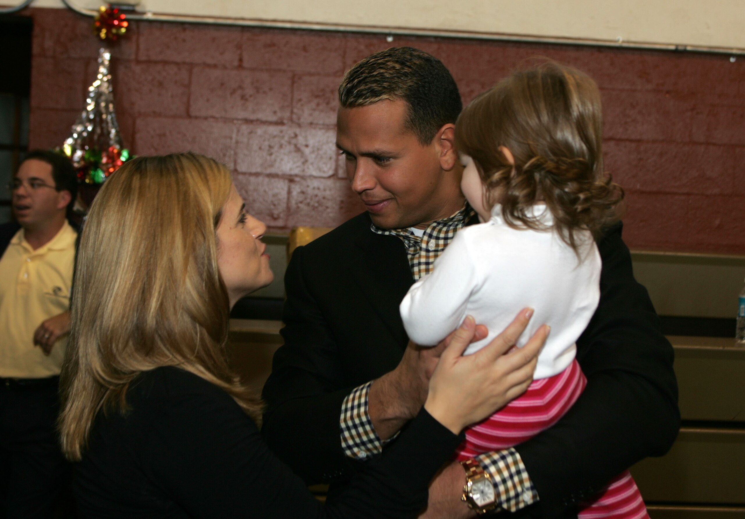 MIAMI - DECEMBER 15:  Baseball player Alex Rodriguez and wife Cynthia host a Christmas party at The Boys and Girls Clubs Of Miami on December 15, 2004 in Miami.  (Photo by Alexander Tamargo/Getty Images)