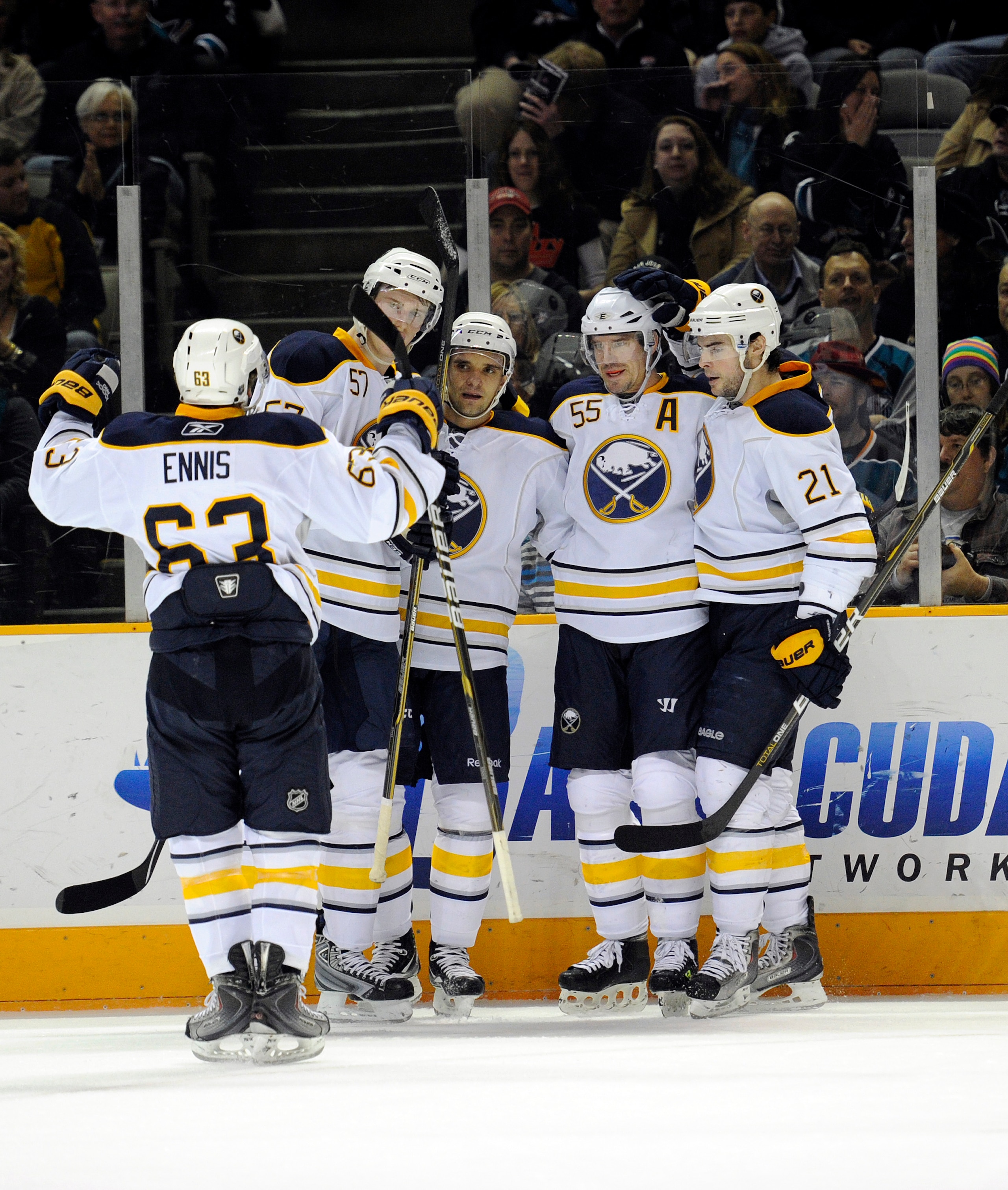 SAN JOSE, CA - JANUARY 6:  Jochen Hecht #55 of the Buffalo Sabres scores a goal against the San Jose Sharks and celebrates with his teammates in the first period  during an NHL hockey game at the HP Pavilion on January 6, 2011 in San Jose, California. The