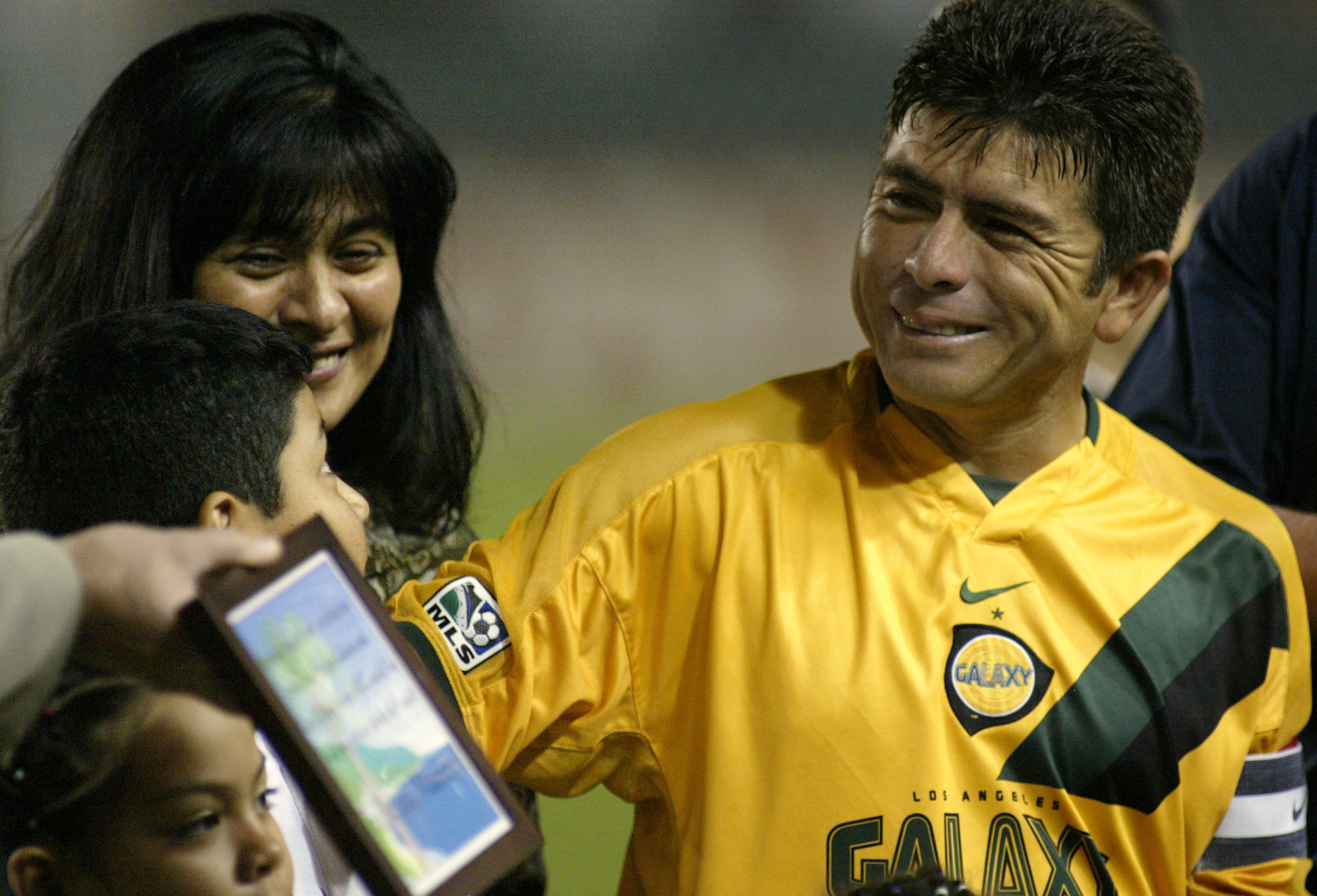CARSON, CA - OCTOBER 18:  Mauricio Cienfuegos #10 of the Los Angeles Galaxy and his family receive a trip to Hawaii as a token of appreciation from the Los Angeles Galaxy organization prior to retiring after this season on October 18, 2003 at the Home Dep