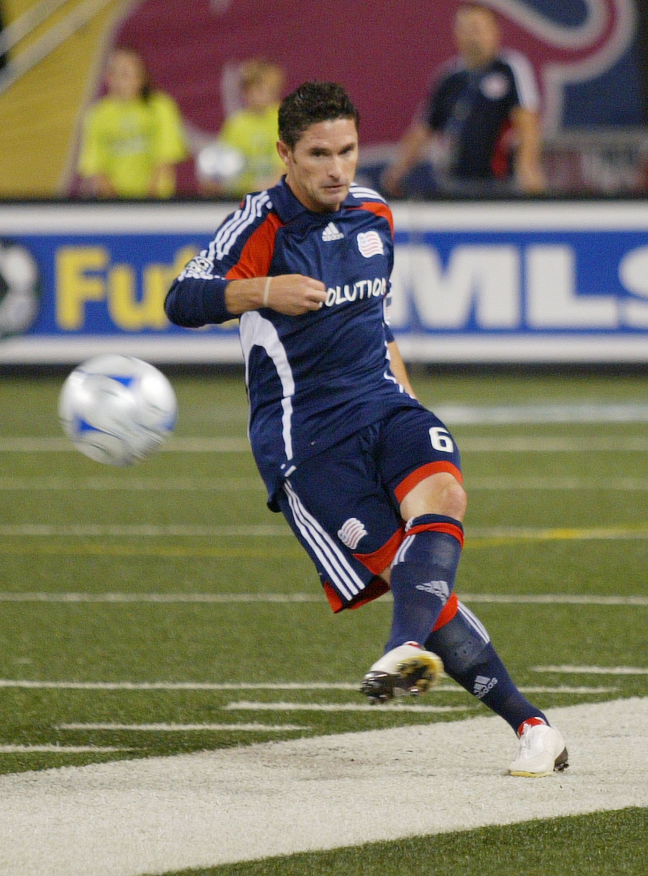 EAST RUTHERFORD, NJ - SEPTEMBER 18: Jay Heaps #6 of the New England Revolution plays the  ball against the New York Red Bulls during their game at Giants Stadium on September 18, 2009 in East Rutherford, New Jersey. The Red Bulls and the Revolution played