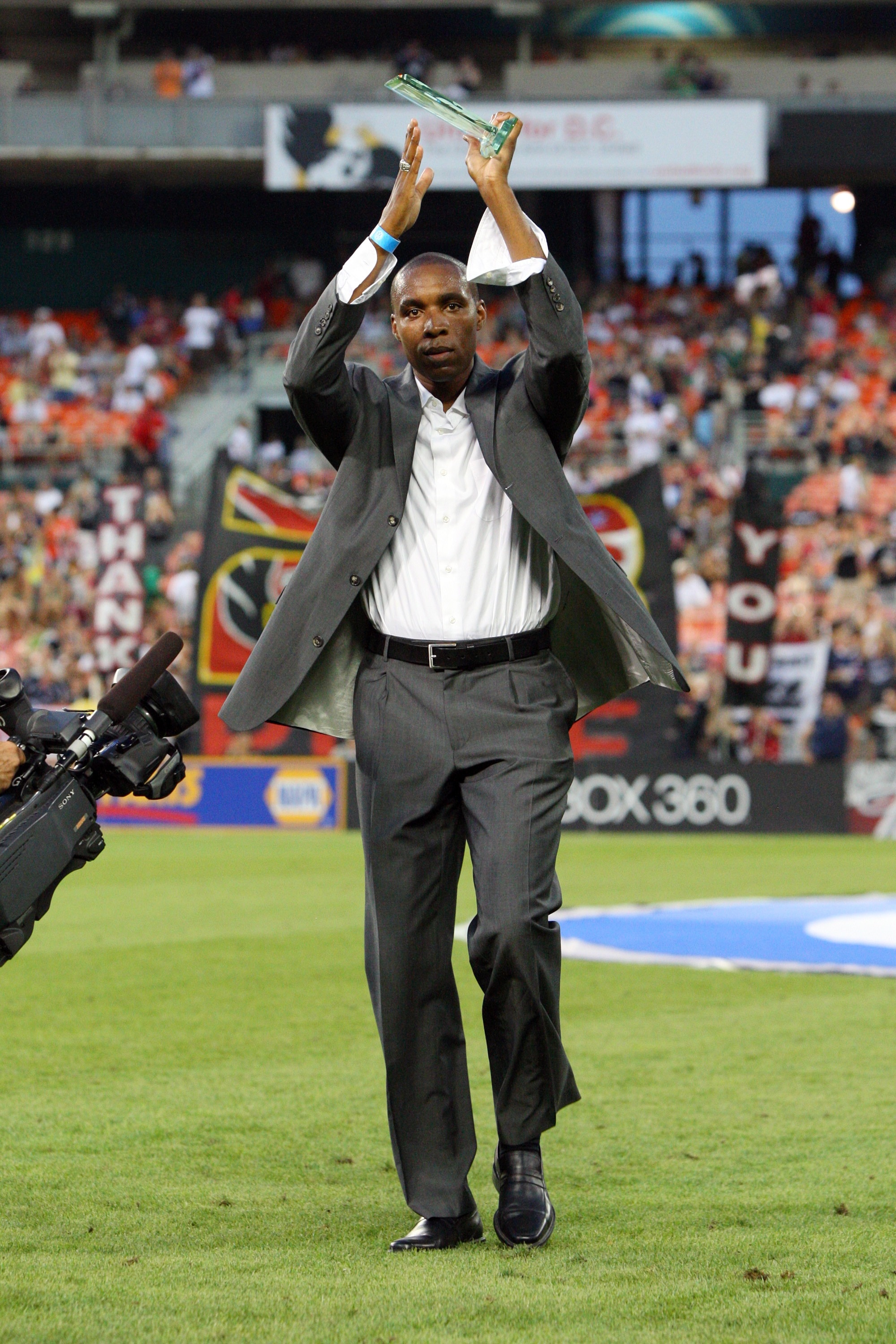 WASHINGTON - JULY 18: Former player Eddie Pope of D.C. United is inducted into the D.C. United Hall of Fame during halftime against the Los Angeles Galaxy at RFK Stadium on July 18, 2010 in Washington, DC. The Galaxy won 2-1. (Photo by Ned Dishman/Getty I
