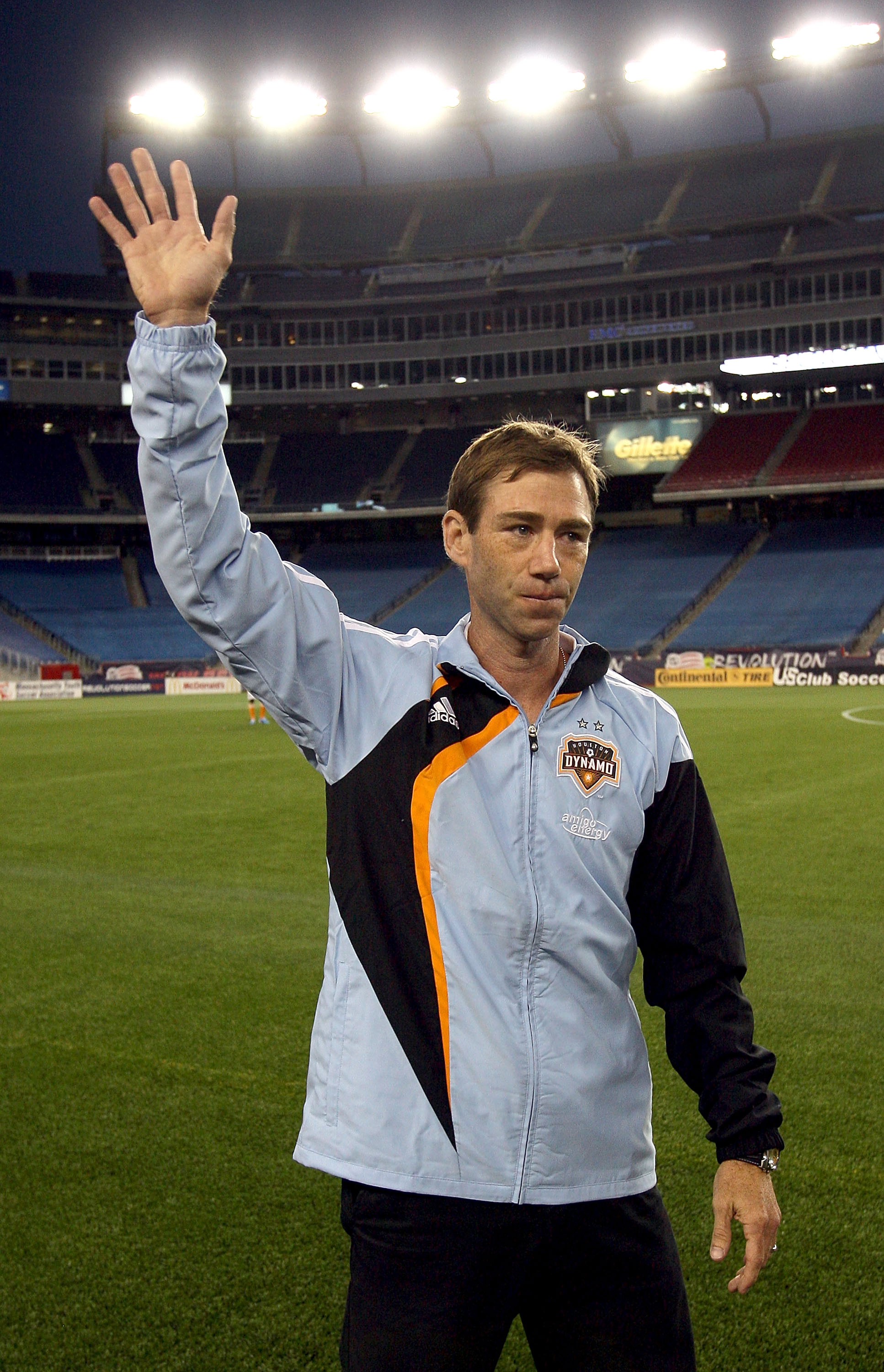 FOXBORO, MA - AUGUST 14: Steve Ralston, a former member of the New England Revolution, reacts to the applause of the fans before a game with Houston Dynamo, the team with which he is now a coach, at Gillette Stadium on August 14, 2010 in Foxboro, Massachu