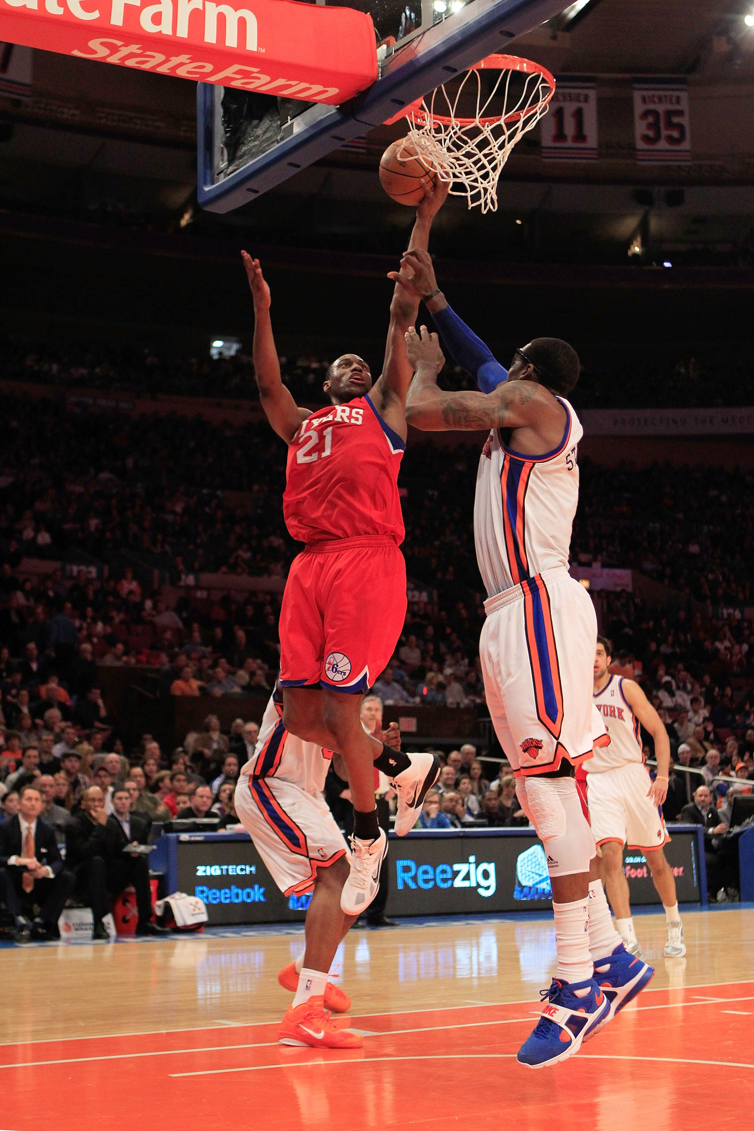 NEW YORK, NY - FEBRUARY 06: Thaddeus Young #21 of the Philadelphia 76ers lays the ball up over Amar'e Stoudemire #1 of the New York Knicks at Madison Square Garden on February 6, 2011 in New York City. NOTE TO USER: User expressly acknowledges and agrees NEW YORK, NY - FEBRUARY 06: Thaddeus Young #21 of the Philadelphia 76ers lays the ball up over Amar'e Stoudemire #1 of the New York Knicks at Madison Square Garden on February 6, 2011 in New York City. NOTE TO USER: User expressly acknowledges and agrees