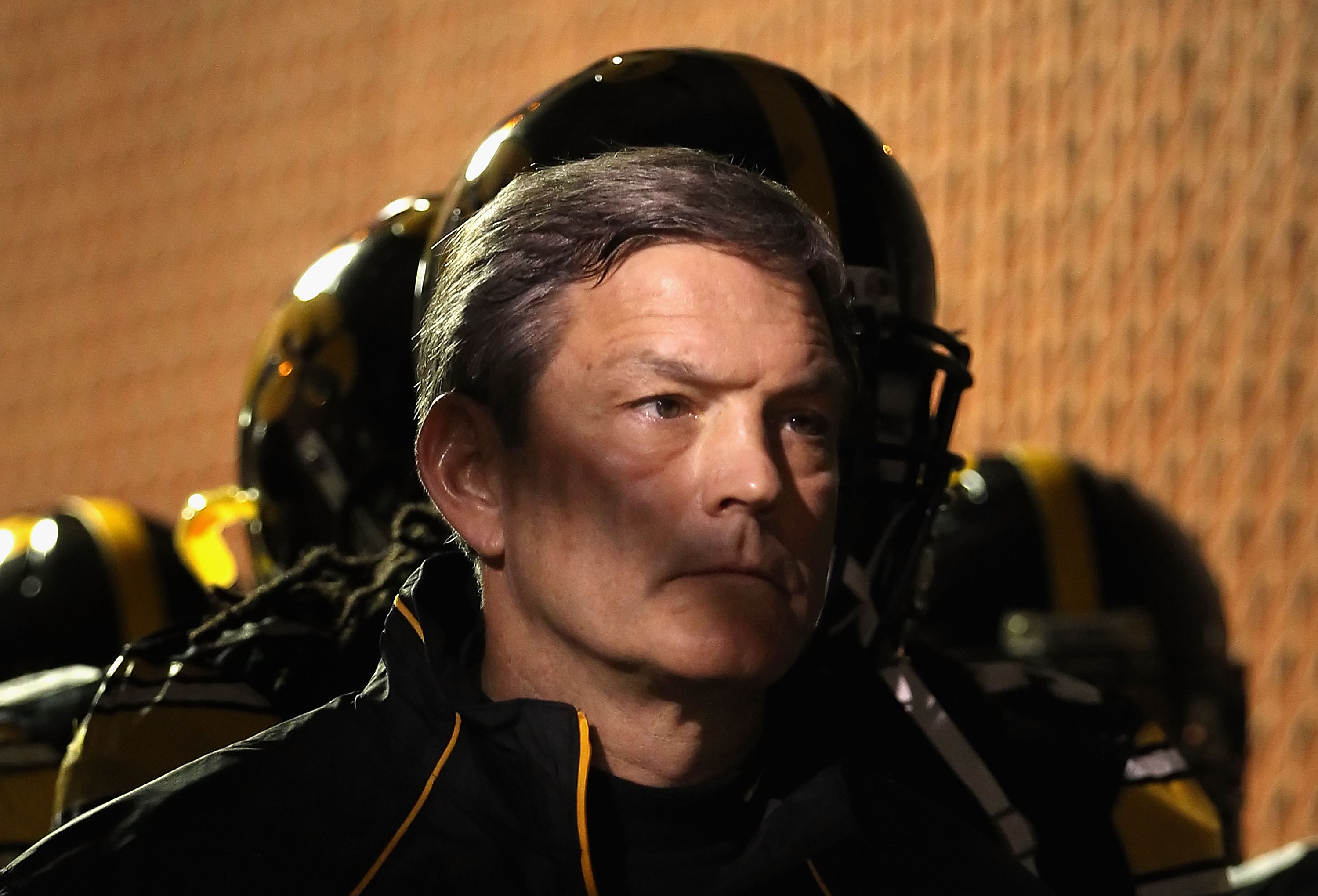 TEMPE, AZ - DECEMBER 28:  Head coach Kirk Ferentz of the Iowa Hawkeyes stands in the tunnel before the Insight Bowl against the Missouri Tigers at Sun Devil Stadium on December 28, 2010 in Tempe, Arizona.  The Hawkeyes defeated the Tigers 27-24.  (Photo b