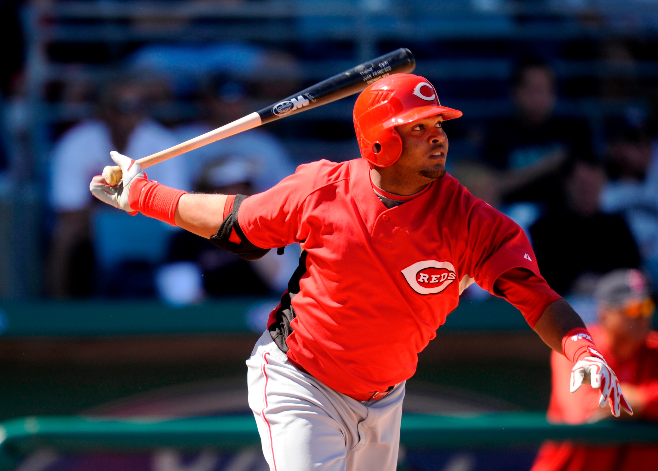 FORT MYERS, FL - MARCH 03: Juan Francisco #68 of the Cincinnati Reds bats against the Boston Red Sox at the City of Palms Park on March 3, 2009 in Fort Myers, Florida.  (Photo by Rob Tringali/Getty Images)