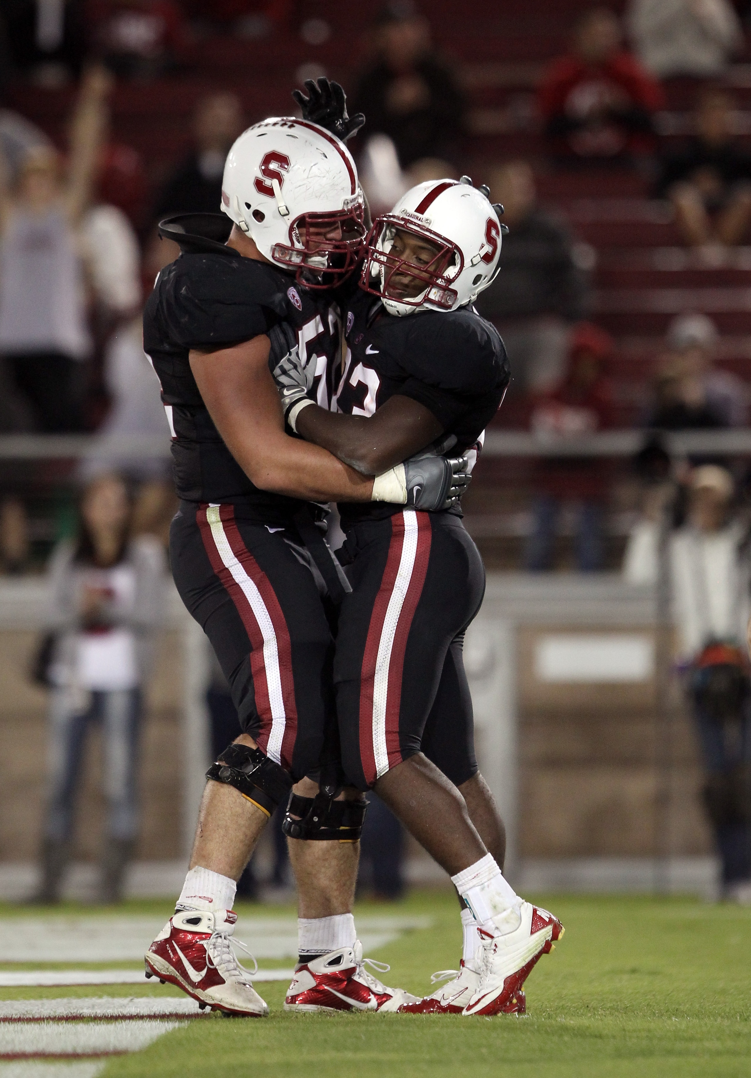 PALO ALTO, CA - SEPTEMBER 18:  Stepfan Taylor #33 of the Stanford Cardinal is congratulated by David DeCastro #52 after he scored a touchdown during their game against the Wake Forest Demon Deacons at Stanford Stadium on September 18, 2010 in Palo Alto, C