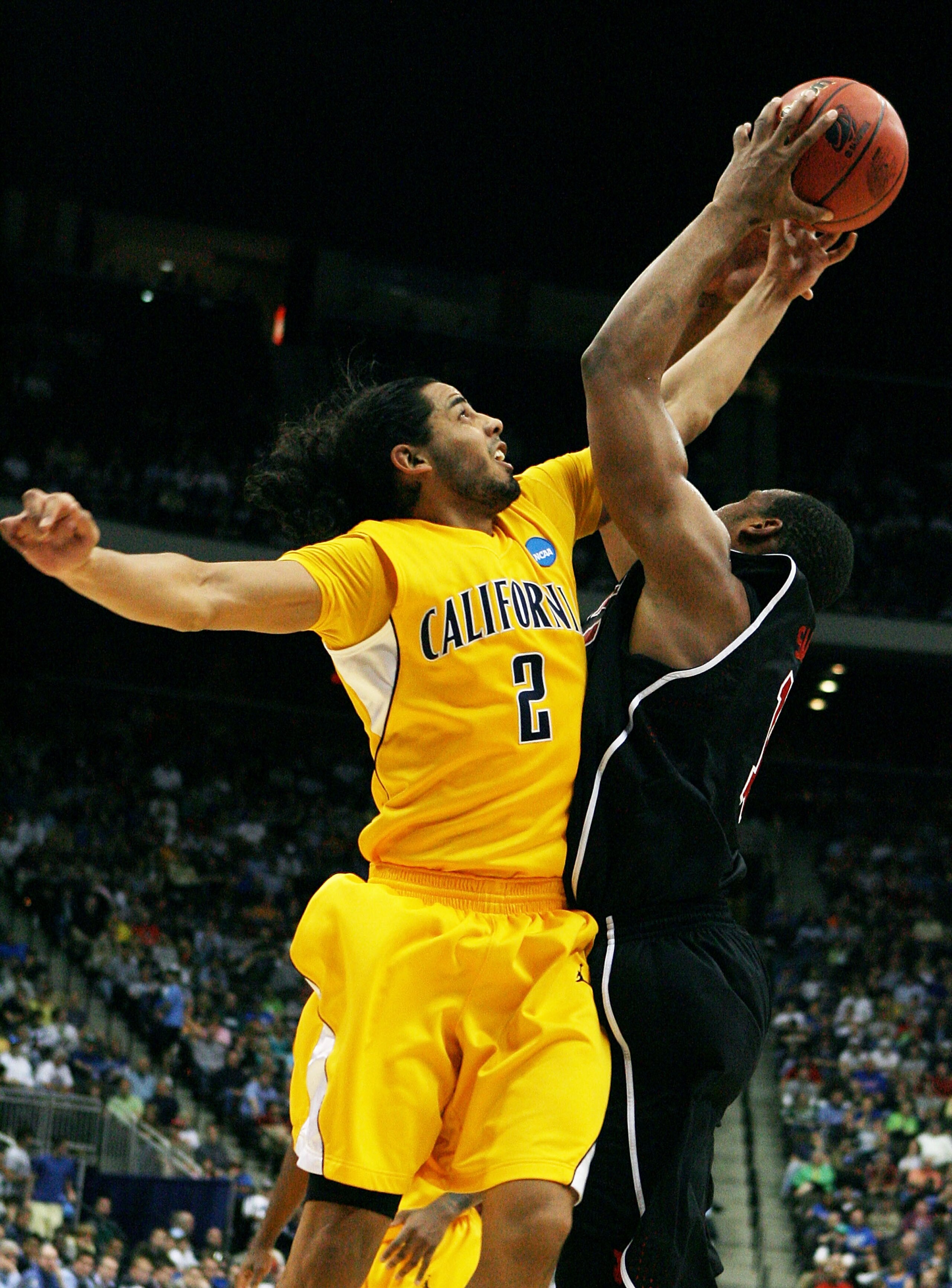 JACKSONVILLE, FL - MARCH 19:  Samardo Samuels #15 of the Louisville Cardinals battles for a rebound with Jorge Gutierrez #2 of the California Golden Bears during the first round of the 2010 NCAA men's basketball tournament at Jacksonville Veteran's Memori