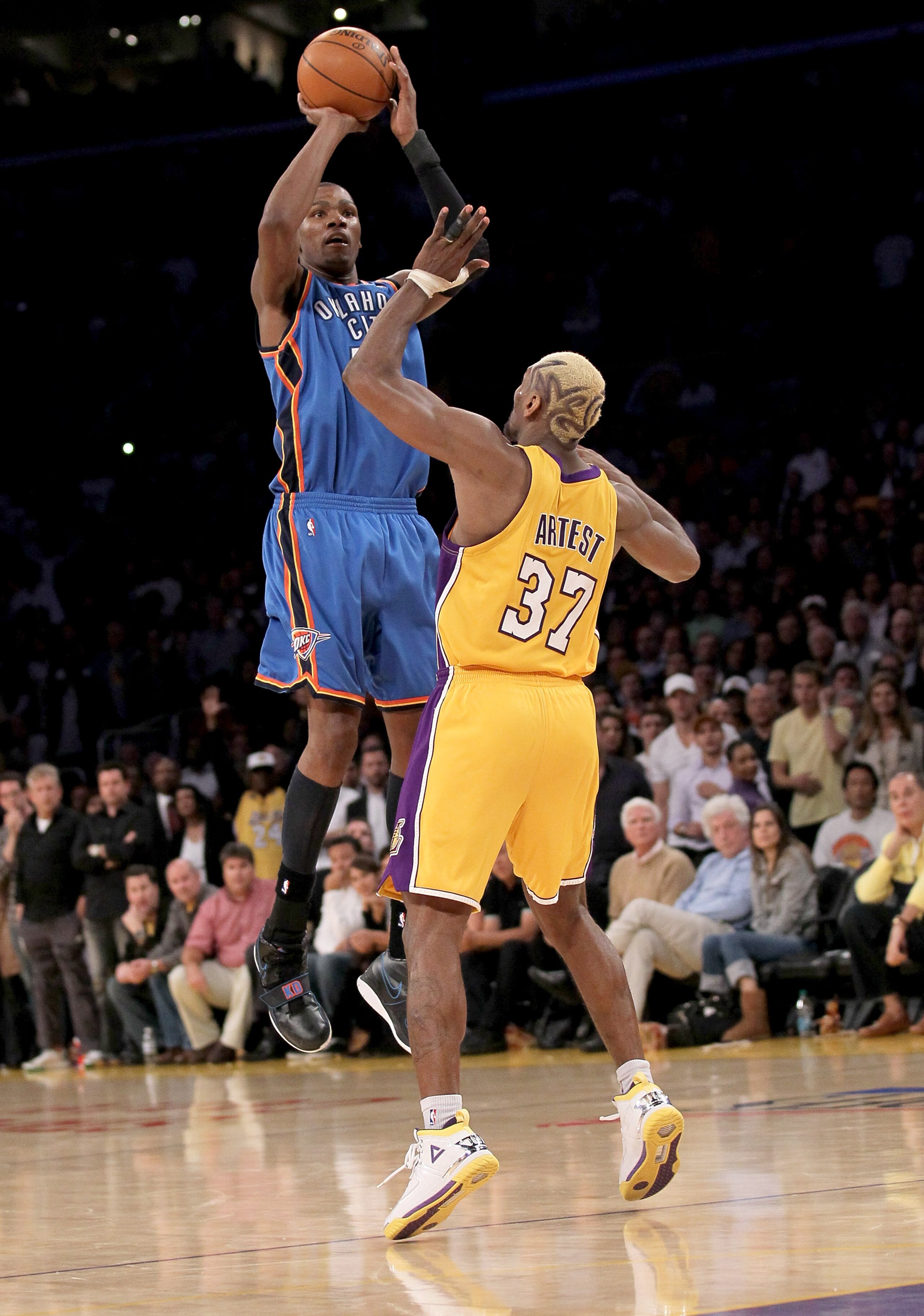 LOS ANGELES - APRIL 20: Kevin Durant #35 of the Oklahoma City Thunder shoots over Ron artest #37 of the Los Angeles Lakers during  Game Two of the Western Conference Quarterfinals of the 2010 NBA Playoffs on April 20, 2010 at Staples Center in Los Angeles