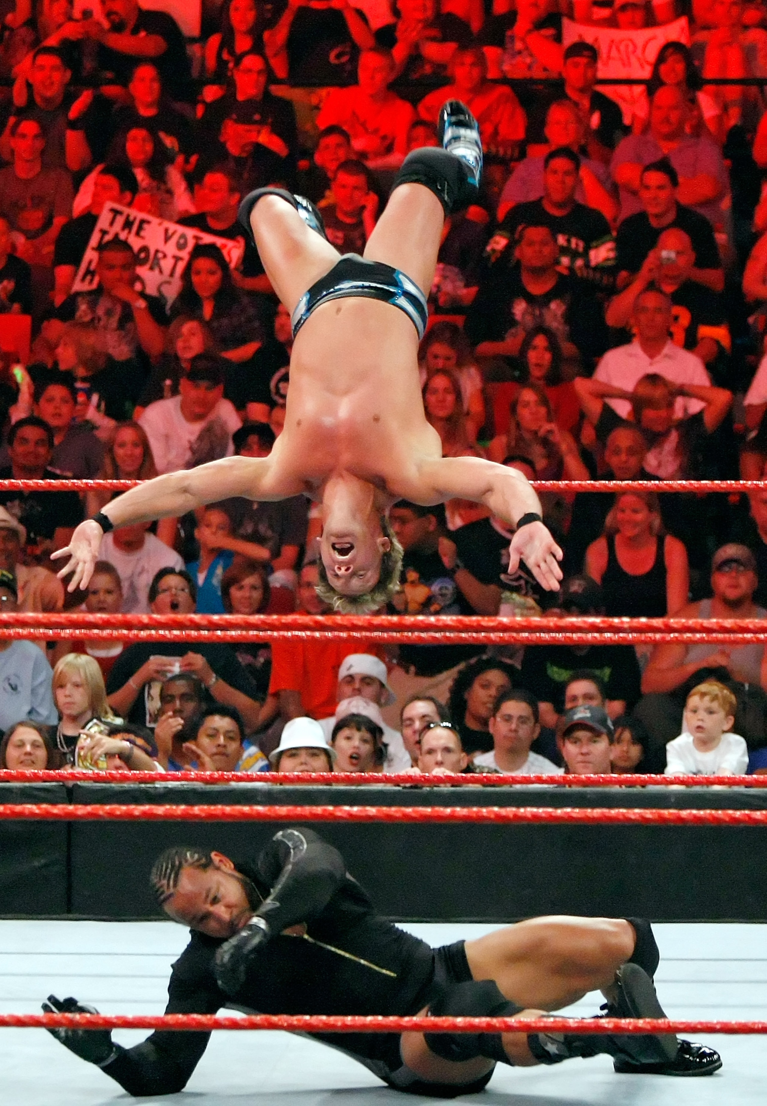 LAS VEGAS - AUGUST 24:  Wrestler Chris Jericho jumps off the ropes at wrestler MVP during the WWE Monday Night Raw show at the Thomas & Mack Center August 24, 2009 in Las Vegas, Nevada.  (Photo by Ethan Miller/Getty Images)