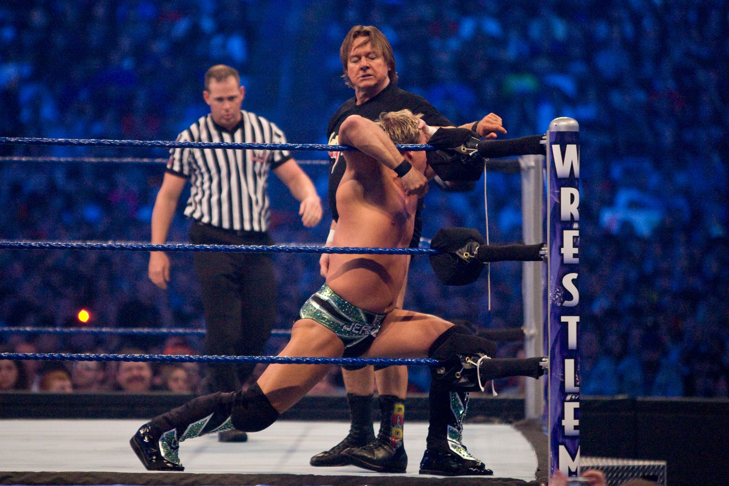 HOUSTON, TX - APRIL 5:  (L-R) 'Rowdy' Roddy Piper battles WWE Superstar Chris Jericho during  WrestleMania 25 at Reliant Stadium on April 5, 2009 in Houston, Texas.  (Photo by Bill Olive/Getty Images)