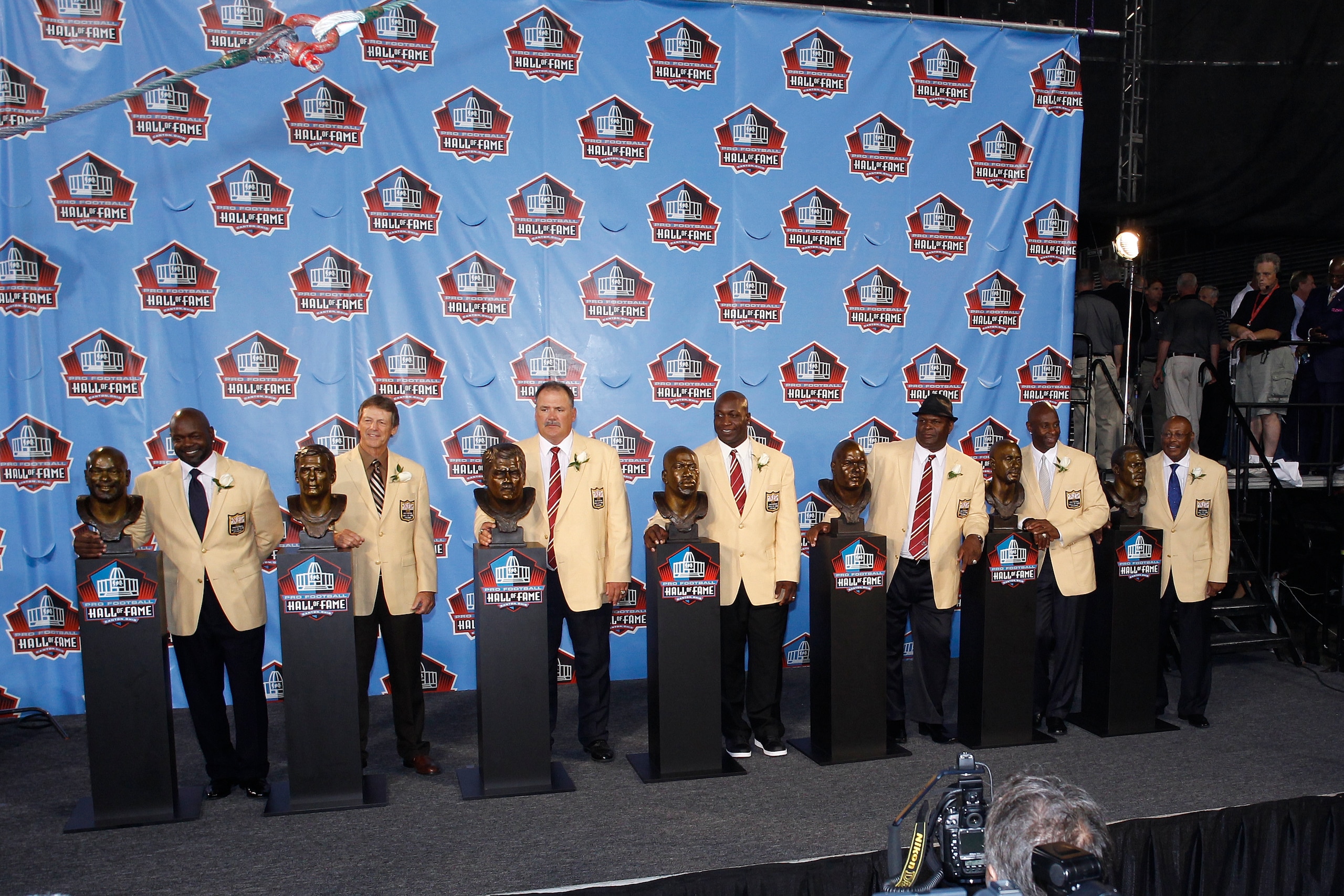 CANTON, OH - AUGUST 7: The Class of 2010 (from left, Emmitt Smith, Dick LeBeau, Russ Grimm, John Randle, Rickey Jackson, Jerry Rice and Floyd Little) pose with their busts following the Pro Football Hall of Fame Enshrinement Ceremony at the Pro Football H