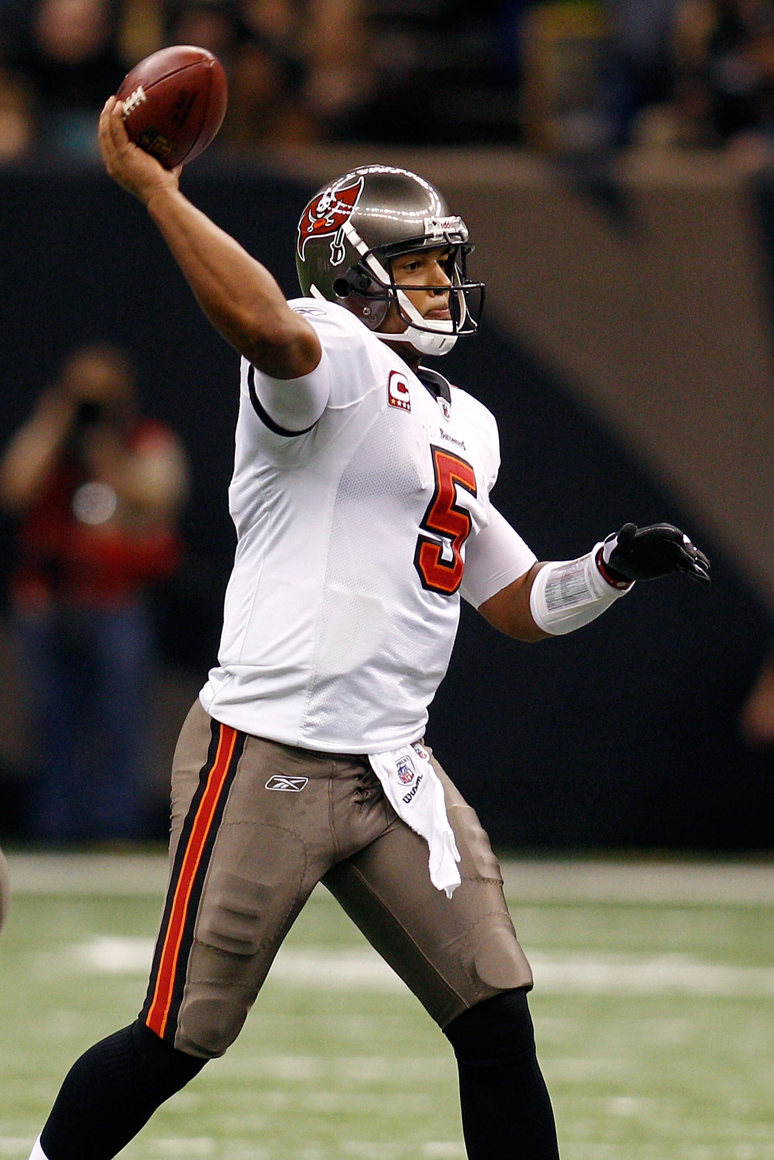 NEW ORLEANS, LA - JANUARY 02:  Quarterback Josh Freeman #5  of the Tampa Bay Buccaneers throws the ball during the game against the New Orleans Saints at the Louisiana Superdome on January 2, 2011 in New Orleans, Louisiana.  (Photo by Chris Graythen/Getty