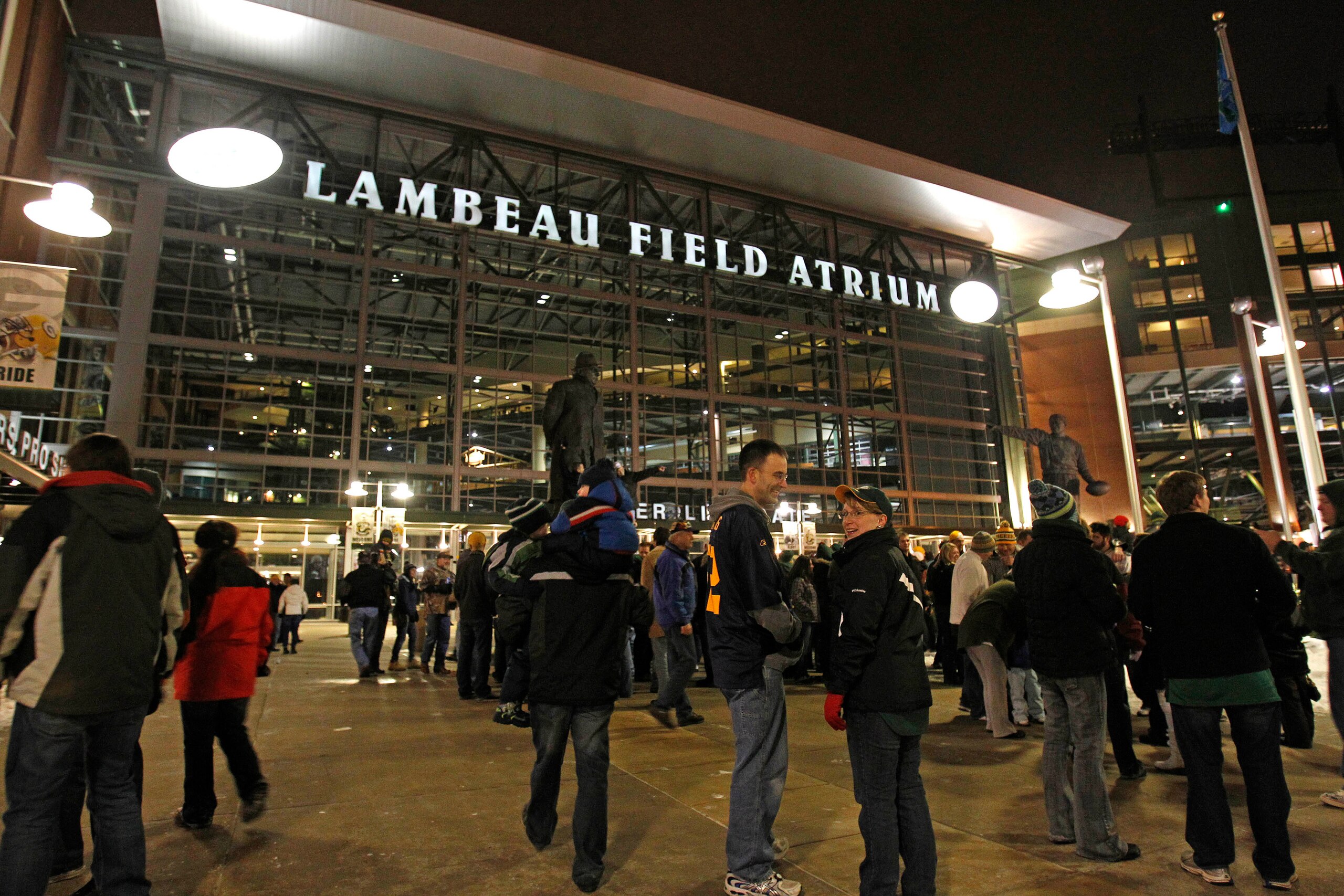 GREEN BAY, WI - FEBRUARY 06: Green Bay Packers fans celebrate the Packers winning the Super Bowl in front of Lambeau Field on February 6, 2011 in Green Bay, Wisconsin.  (Photo by Matt Ludtke/Getty Images)