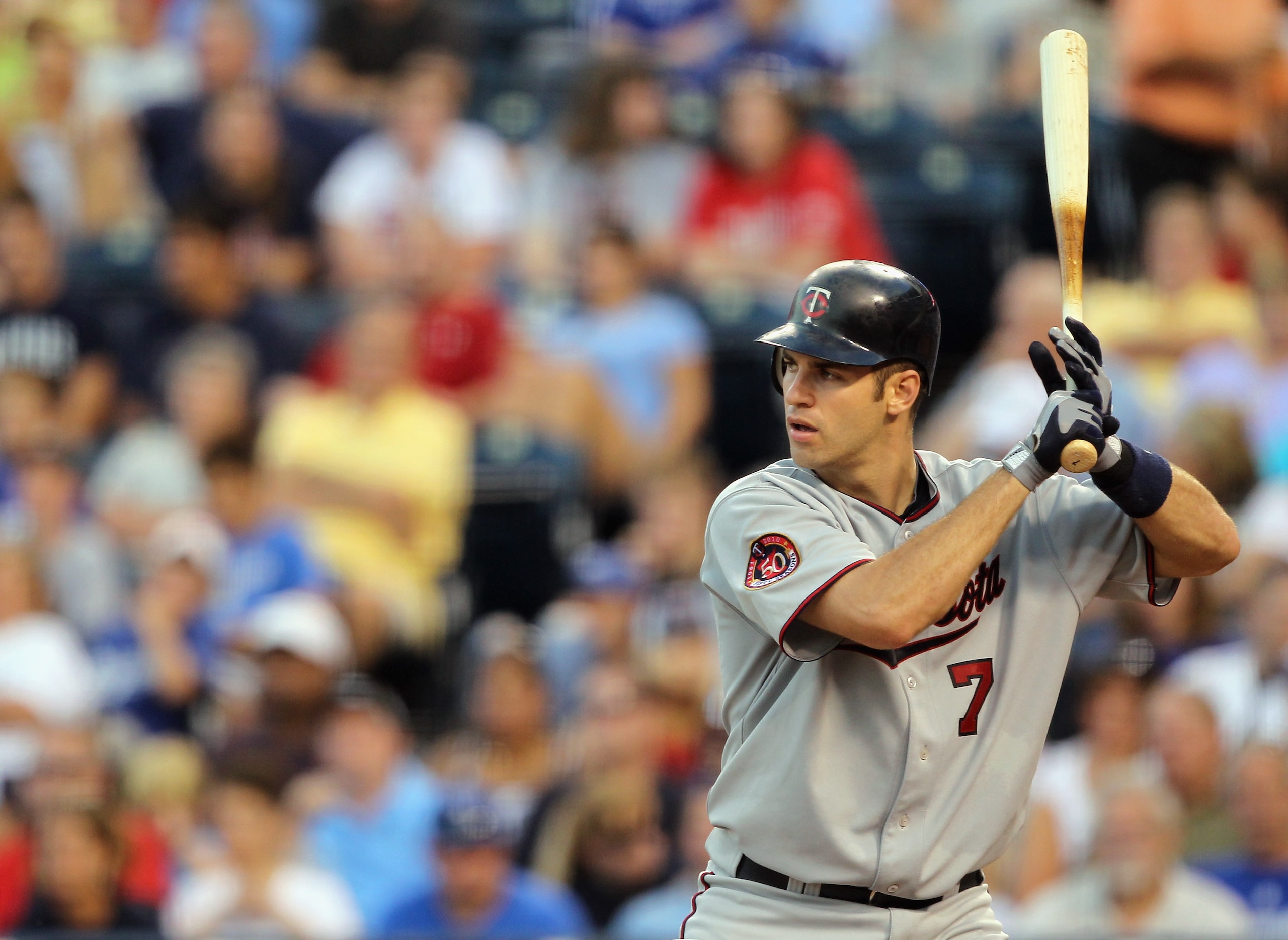 KANSAS CITY, MO - JULY 26:  Catcher Joe Mauer #7 of the Minnesota Twins bats during the game against the Kansas City Royals on July 26, 2010 at Kauffman Stadium in Kansas City, Missouri.  (Photo by Jamie Squire/Getty Images)
