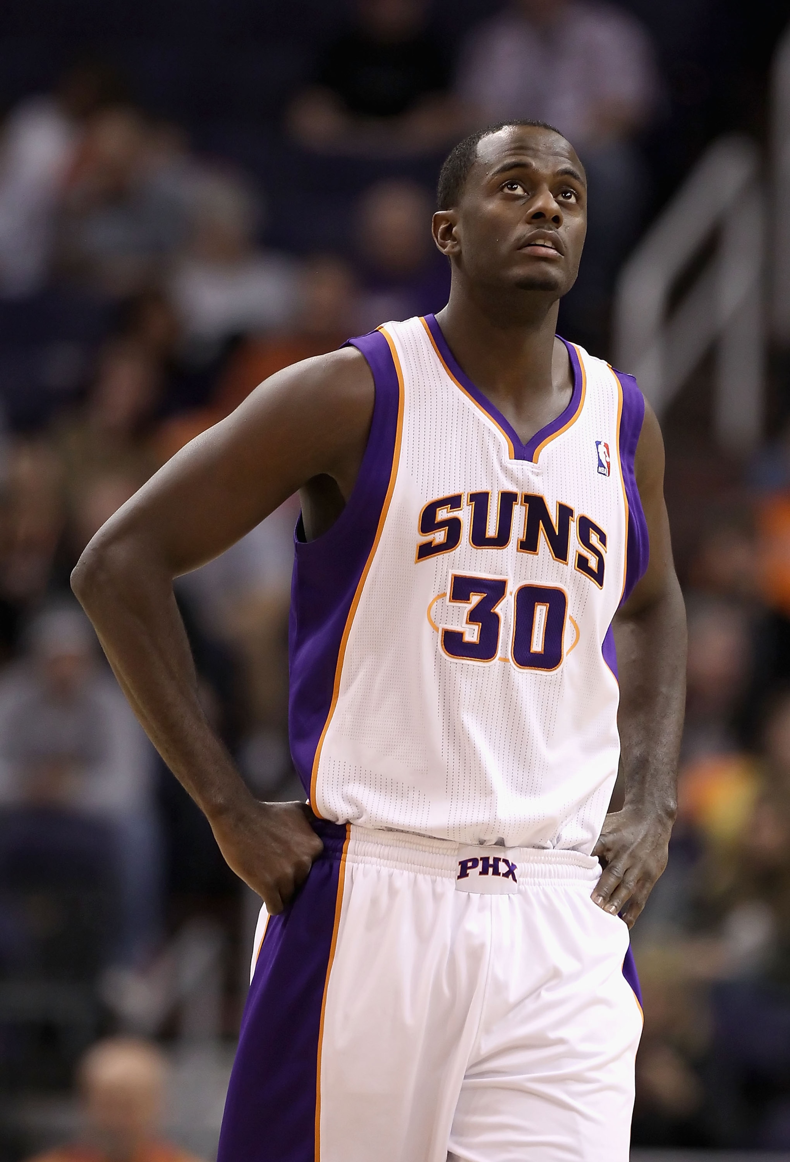 PHOENIX - DECEMBER 10: Earl Barron #30 of the Phoenix Suns during the NBA game against the Portland Trail Blazers at US Airways Center on December 10, 2010 in Phoenix, Arizona. The Trail Blazers defeated the Suns 101-94. NOTE TO USER: User expressly ack PHOENIX - DECEMBER 10: Earl Barron #30 of the Phoenix Suns during the NBA game against the Portland Trail Blazers at US Airways Center on December 10, 2010 in Phoenix, Arizona. The Trail Blazers defeated the Suns 101-94. NOTE TO USER: User expressly ack