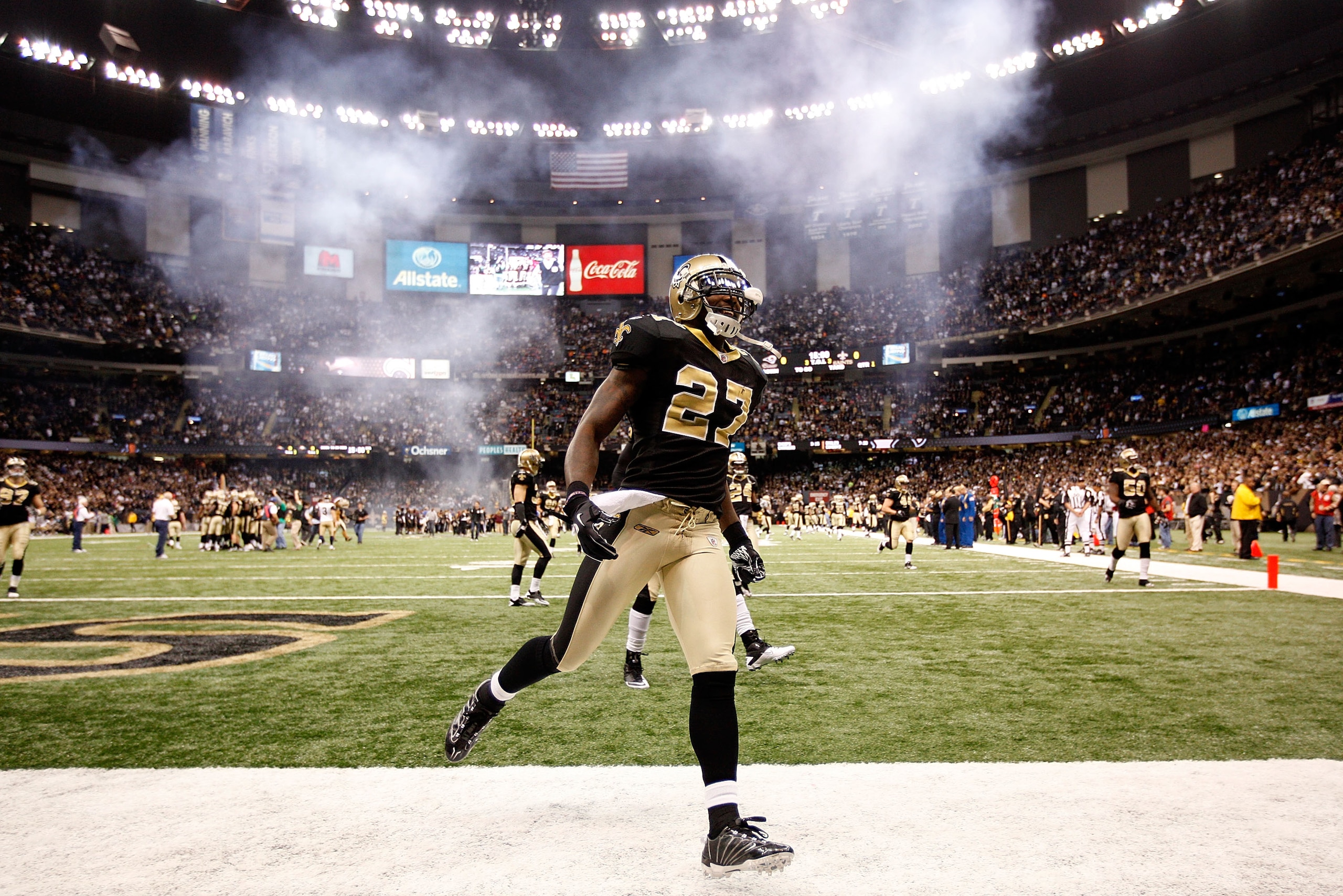 NEW ORLEANS, LA - DECEMBER 12:  Malcom Jenkins #27 of the New Orleans Saints runs onto the field before playing the St. Louis Rams at the Louisiana Superdome on December 12, 2010 in New Orleans, Louisiana.  (Photo by Chris Graythen/Getty Images)