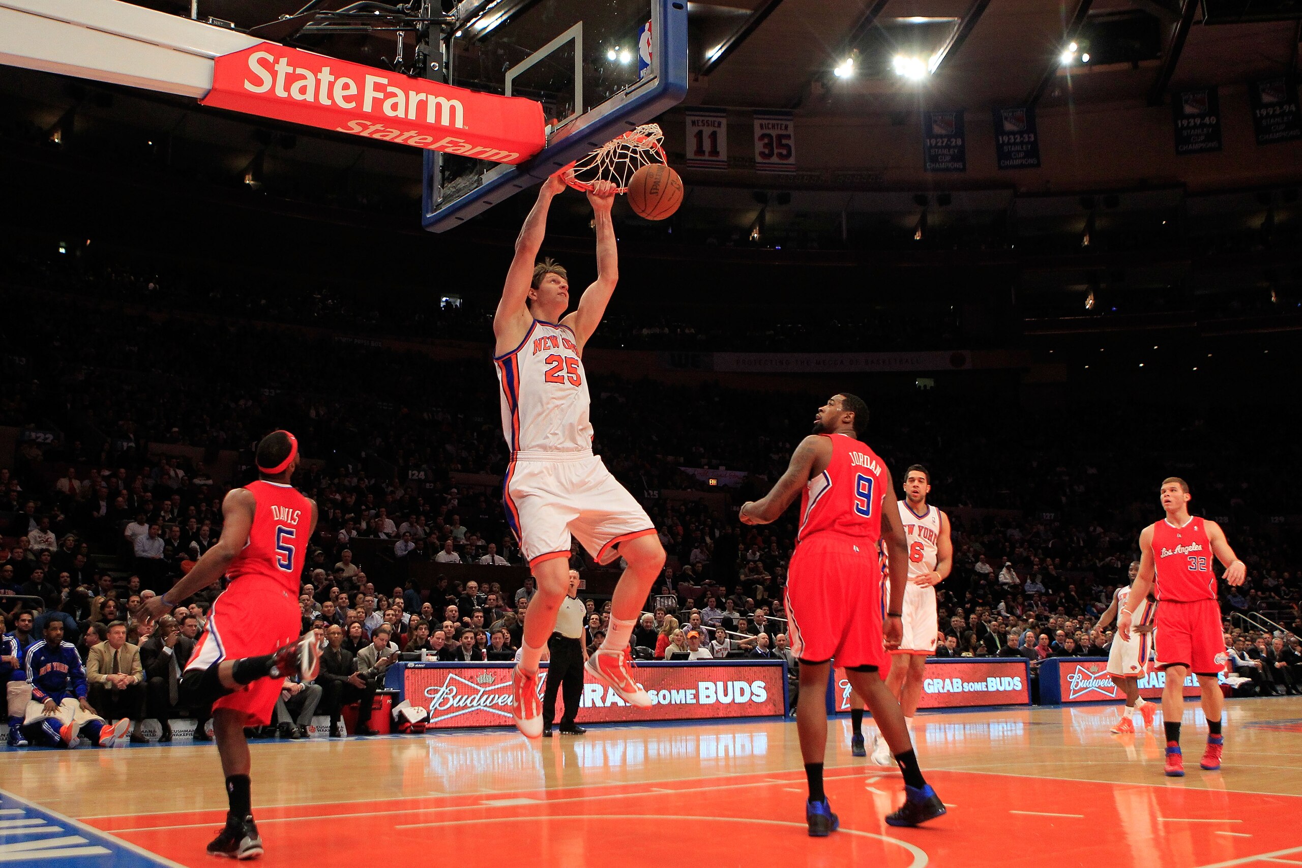 NEW YORK, NY - FEBRUARY 09: Timofey Mozgov #25 of the New York Knicks dunks the ball against the Los Angeles Clippers at Madison Square Garden on February 9, 2011 in New York City. NOTE TO USER: User expressly acknowledges and agrees that, by downloading NEW YORK, NY - FEBRUARY 09: Timofey Mozgov #25 of the New York Knicks dunks the ball against the Los Angeles Clippers at Madison Square Garden on February 9, 2011 in New York City. NOTE TO USER: User expressly acknowledges and agrees that, by downloading