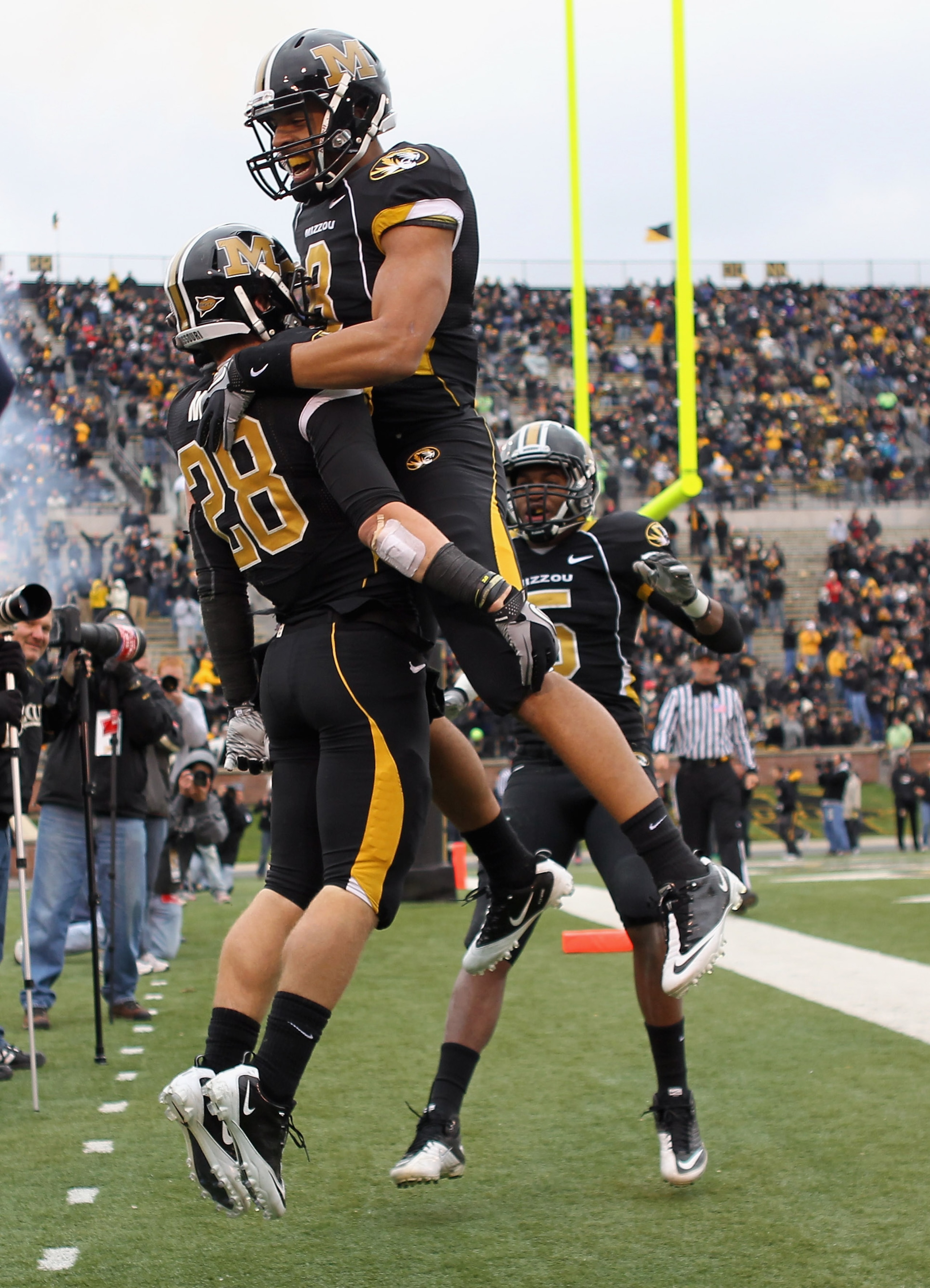 COLUMBIA, MO - NOVEMBER 13: Wes Kemp #8 of the Missouri Tigers congratulates T.J.Moe #28 in the end zone after Moe scored a touchdown during the game against the Kansas State Wildcats on November 13, 2010 at Faurot Field/Memorial Stadium in Columbia, Mi COLUMBIA, MO - NOVEMBER 13: Wes Kemp #8 of the Missouri Tigers congratulates T.J.Moe #28 in the end zone after Moe scored a touchdown during the game against the Kansas State Wildcats on November 13, 2010 at Faurot Field/Memorial Stadium in Columbia, Mi