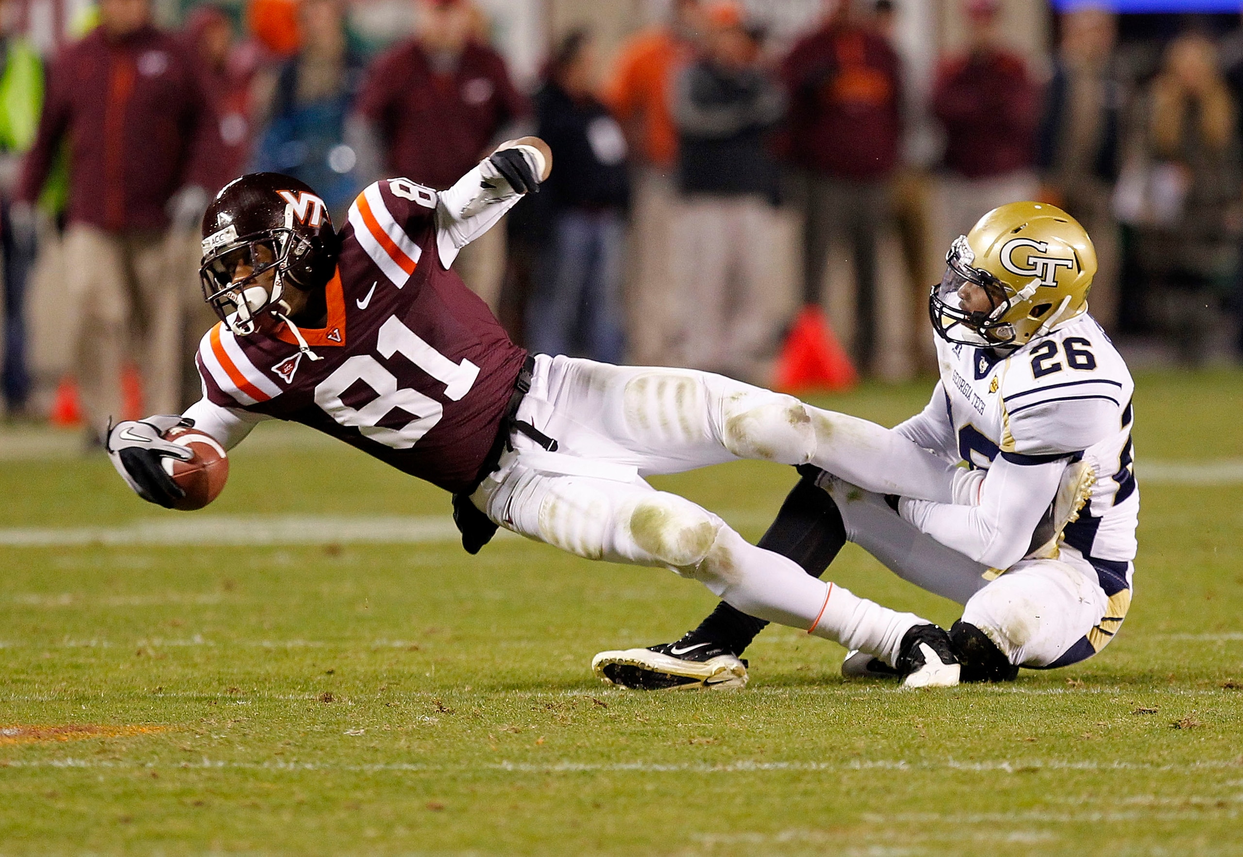 BLACKSBURG, VA - NOVEMBER 04: Wide receiver Jarrett Boykin #81 of the Virginia Tech Hokies dives after catching the ball as cornerback Dominique Reese #26 of the Georgia Tech Yellow Jackets makes the tackle at Lane Stadium on November 4, 2010 in Blacksbur BLACKSBURG, VA - NOVEMBER 04: Wide receiver Jarrett Boykin #81 of the Virginia Tech Hokies dives after catching the ball as cornerback Dominique Reese #26 of the Georgia Tech Yellow Jackets makes the tackle at Lane Stadium on November 4, 2010 in Blacksbur