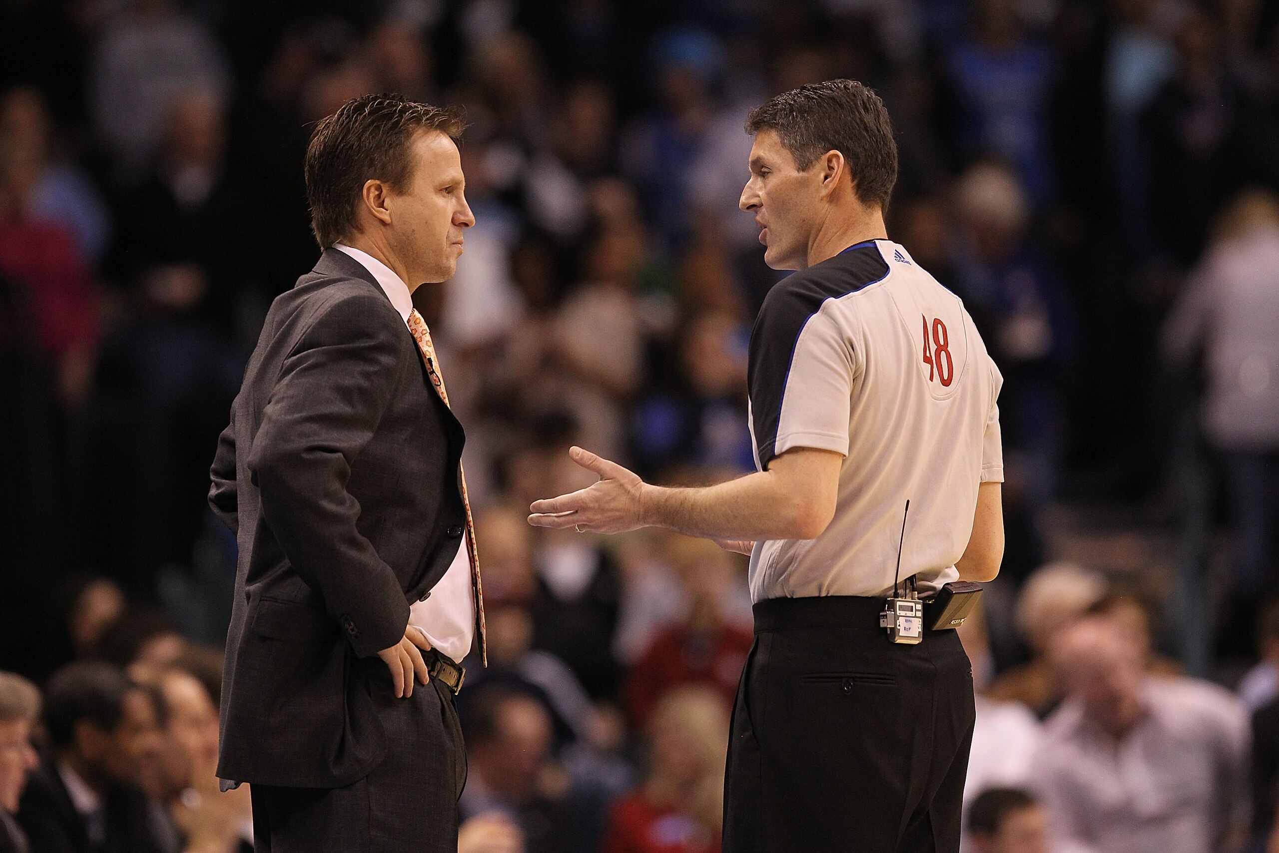 OKLAHOMA CITY, OK - JANUARY 30:  Head coach Scott Brooks of the Oklahoma City Thunder and NBA referee Scott Foster #48 at Ford Center on January 30, 2011 in Oklahoma City, Oklahoma.  NOTE TO USER: User expressly acknowledges and agrees that, by downloadin
