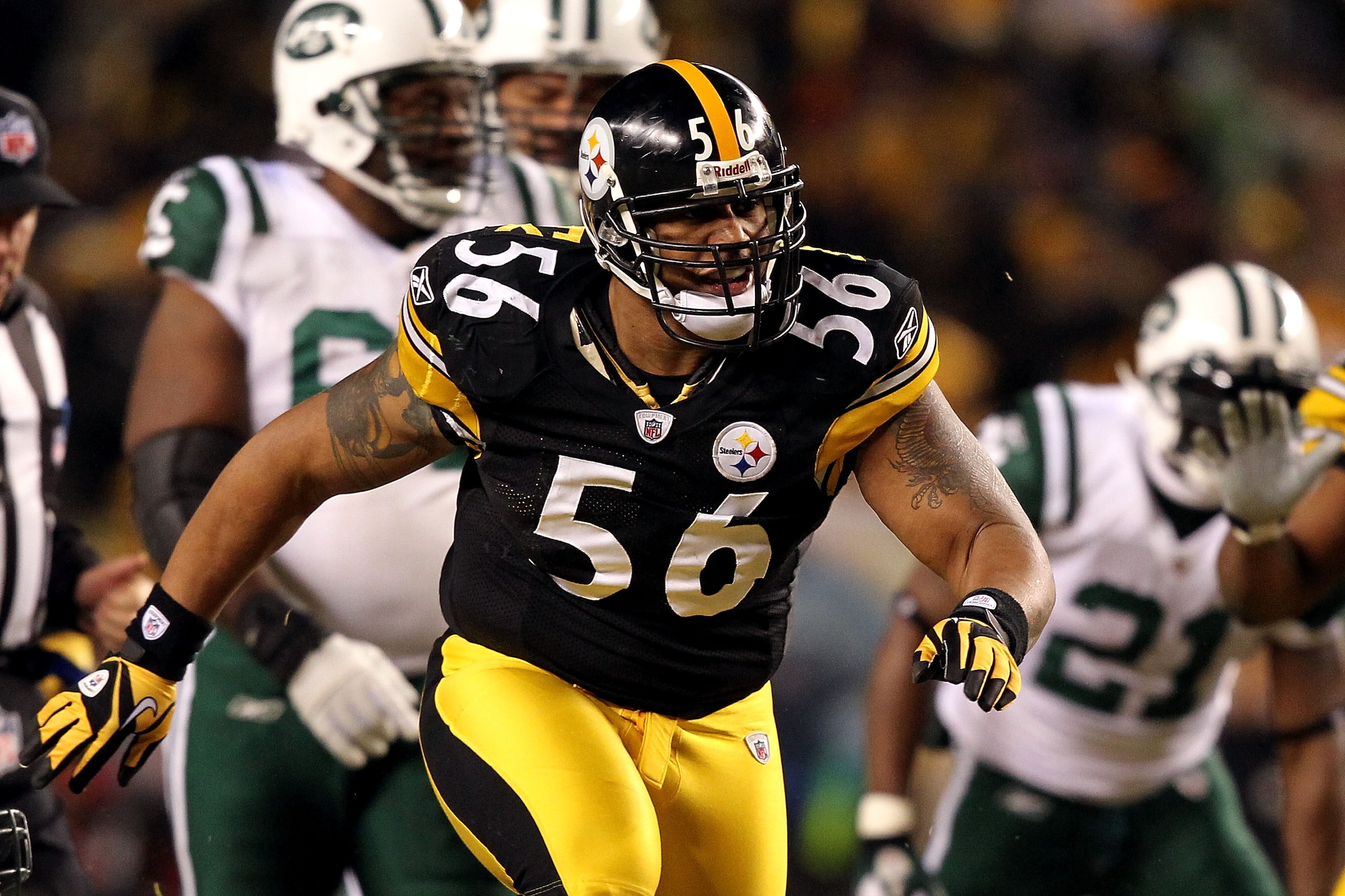 PITTSBURGH, PA - JANUARY 23:  LaMarr Woodley #56 of the Pittsburgh Steelers reacts after a sack against the New York Jets during the 2011 AFC Championship game at Heinz Field on January 23, 2011 in Pittsburgh, Pennsylvania. The Steelers won 24-19. (Photo 