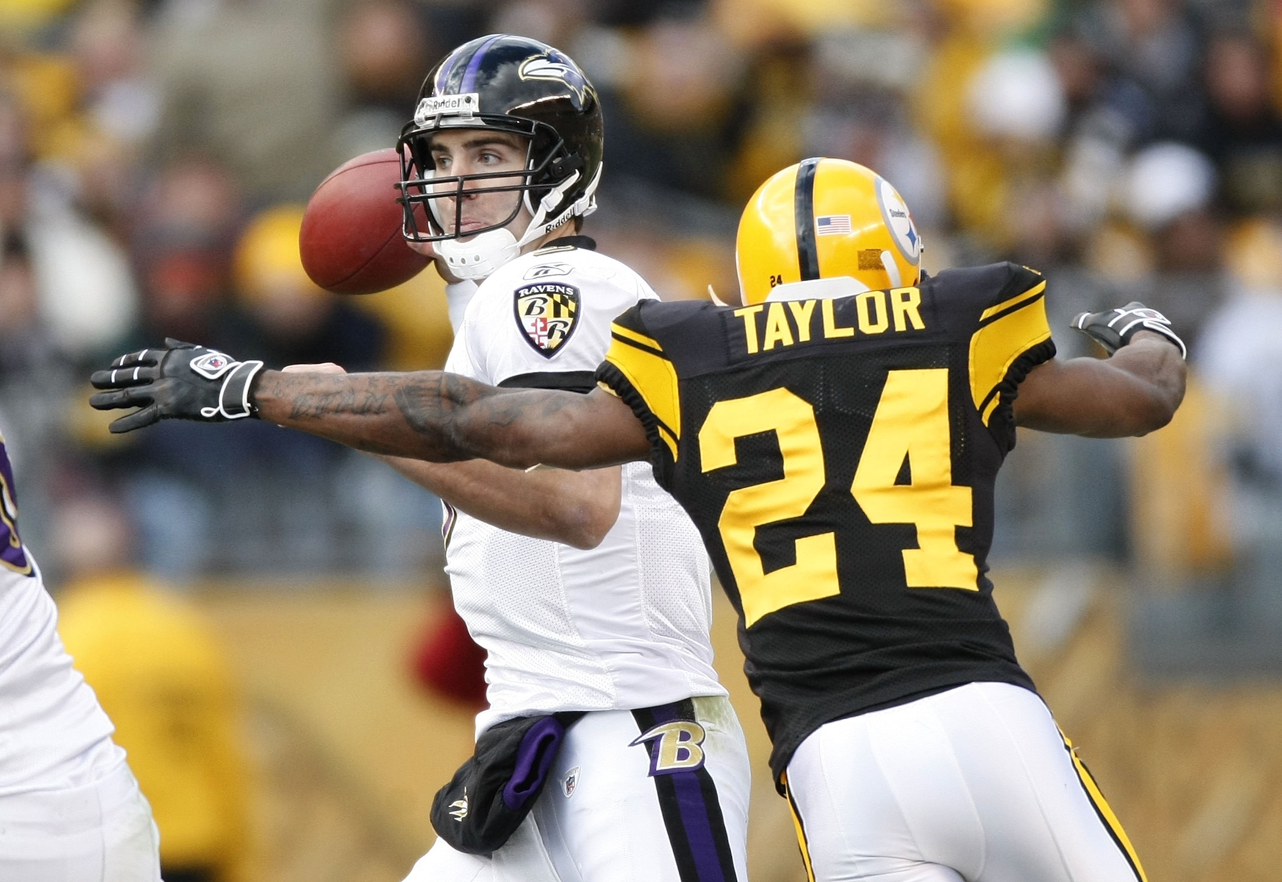 PITTSBURGH - DECEMBER 27:  Ike Taylor #24 of the Pittsburgh Steelers sacks Joe Flacco #5 of the Baltimore Ravens on December 27, 2009 at Heinz Field in Pittsburgh, Pennsylvania. Pittsburgh won the game 23-20.  (Photo by Gregory Shamus/Getty Images)