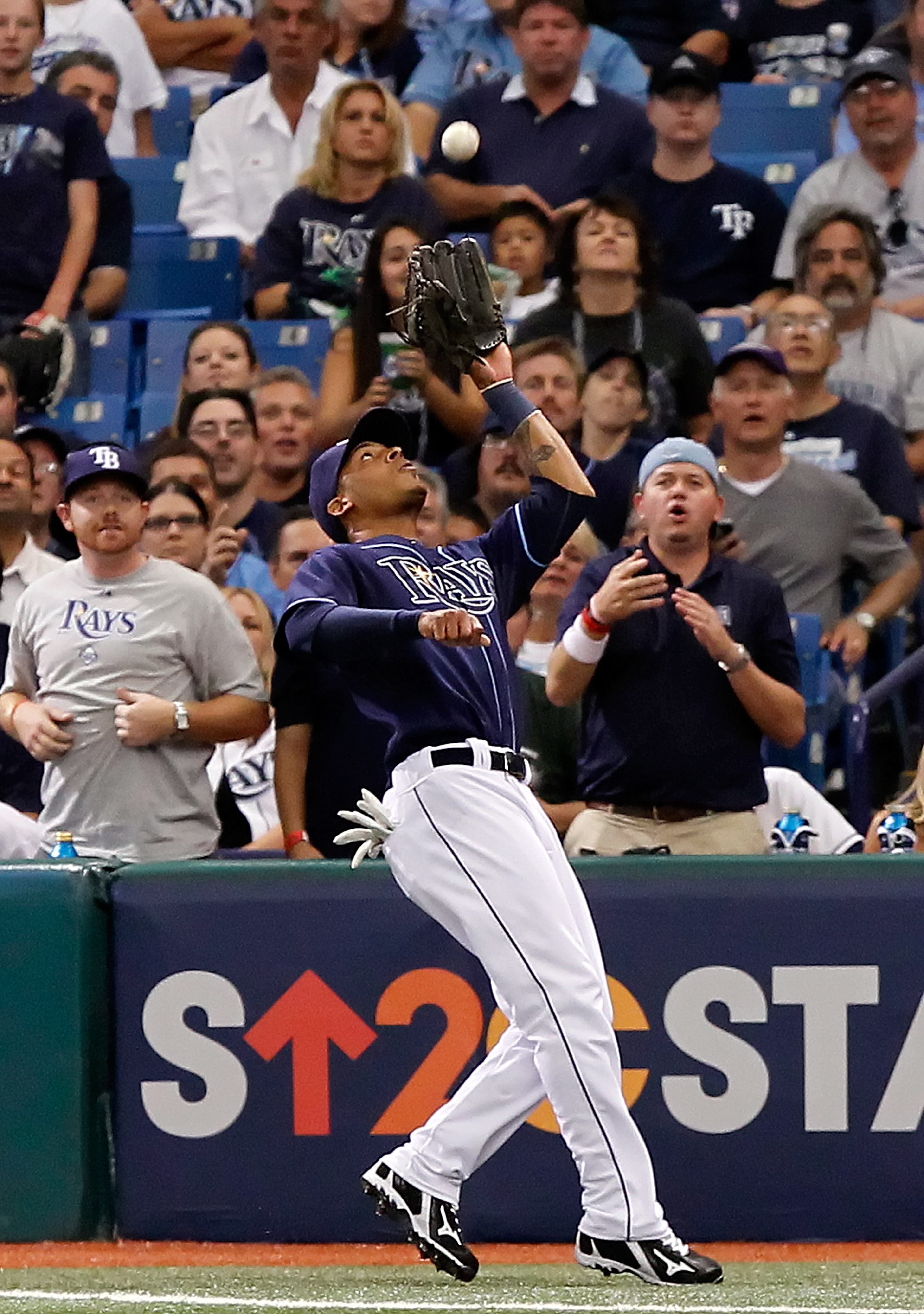 ST. PETERSBURG - OCTOBER 07: Outfielder Desmond Jennings #27 of the Tampa Bay Rays catches a foul ball against the Texas Rangers during Game 2 of the ALDS at Tropicana Field on October 7, 2010 in St. Petersburg, Florida. (Photo by J. Meric/Getty Images) ST. PETERSBURG - OCTOBER 07: Outfielder Desmond Jennings #27 of the Tampa Bay Rays catches a foul ball against the Texas Rangers during Game 2 of the ALDS at Tropicana Field on October 7, 2010 in St. Petersburg, Florida. (Photo by J. Meric/Getty Images)