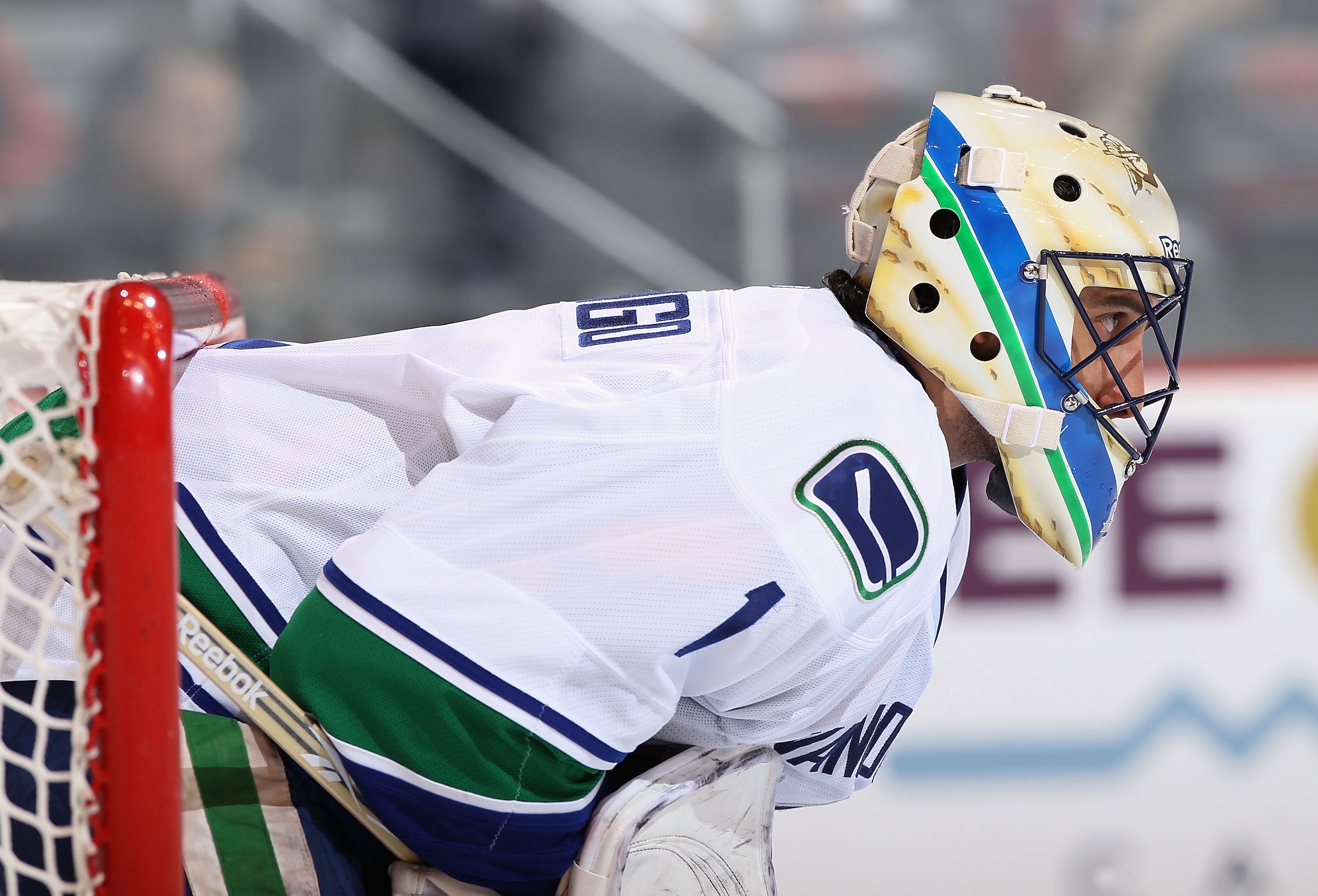 GLENDALE, AZ - FEBRUARY 02:  Goaltender Roberto Luongo #1 of the Vancouver Canucks looks up ice during the NHL game against the Phoenix Coyotes at Jobing.com Arena on February 2, 2011 in Glendale, Arizona.  (Photo by Christian Petersen/Getty Images)