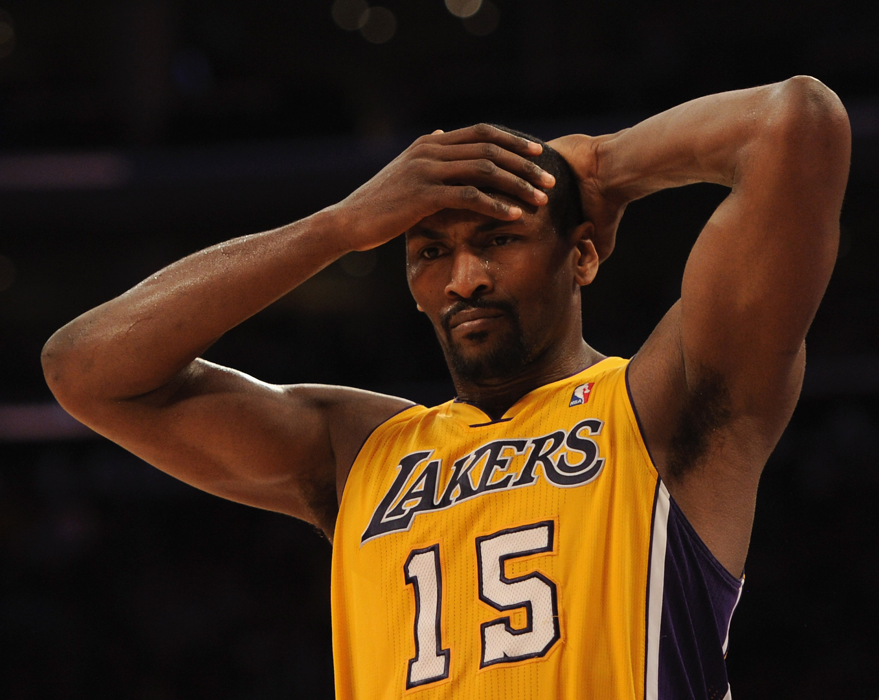 LOS ANGELES, CA - FEBRUARY 03:  Ron Artest #15 of the Los Angeles Lakers reacts on defense after a San Antonio Spurs basket during a 89-88 Spur win at Staples Center on February 3, 2011 in Los Angeles, California.  NOTE TO USER: User expressly acknowledge